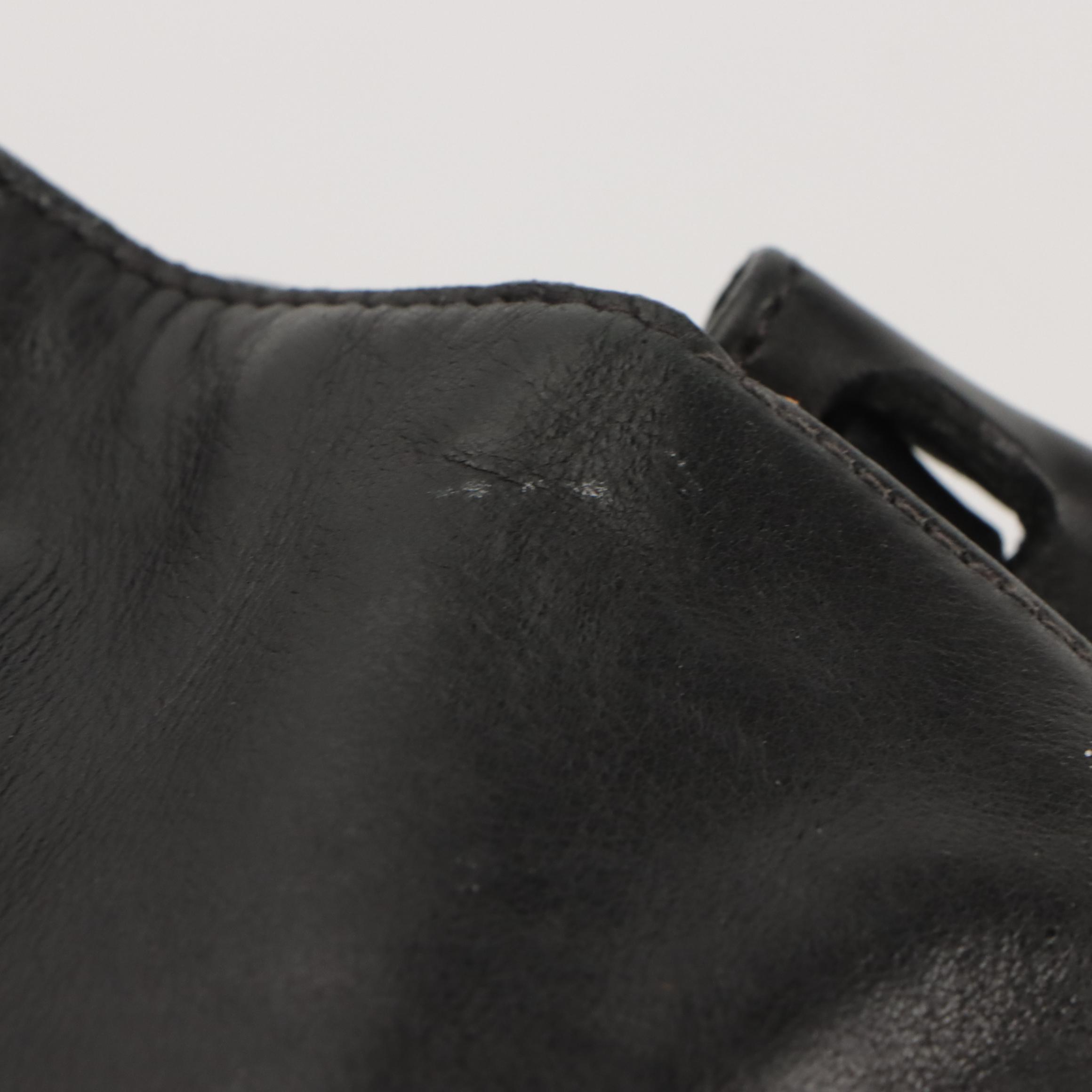 Prada Fold Over Tuck Lock Shoulder Bag in Black Leather