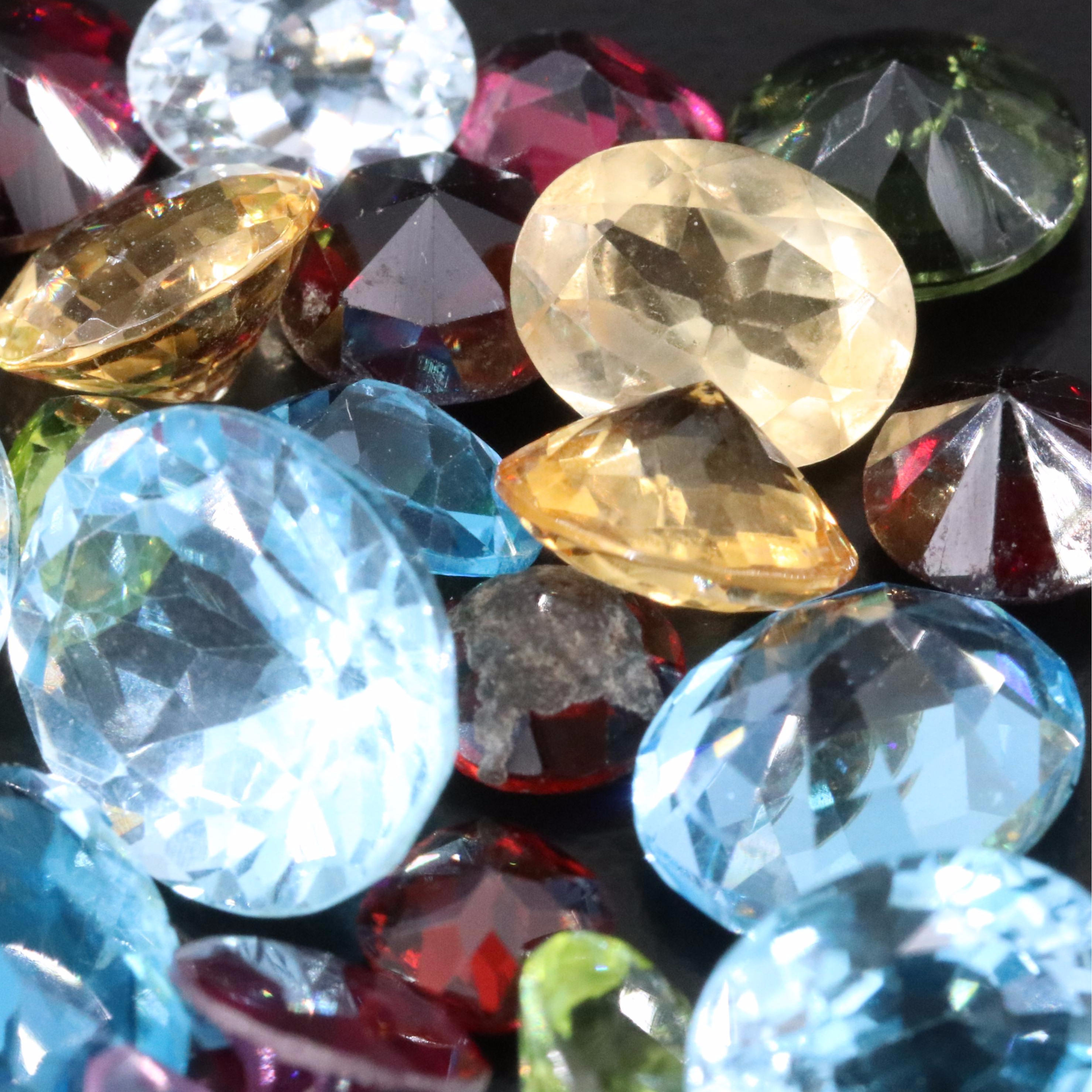 Loose 52.50 CTW Topaz, Moldavite and Garnet