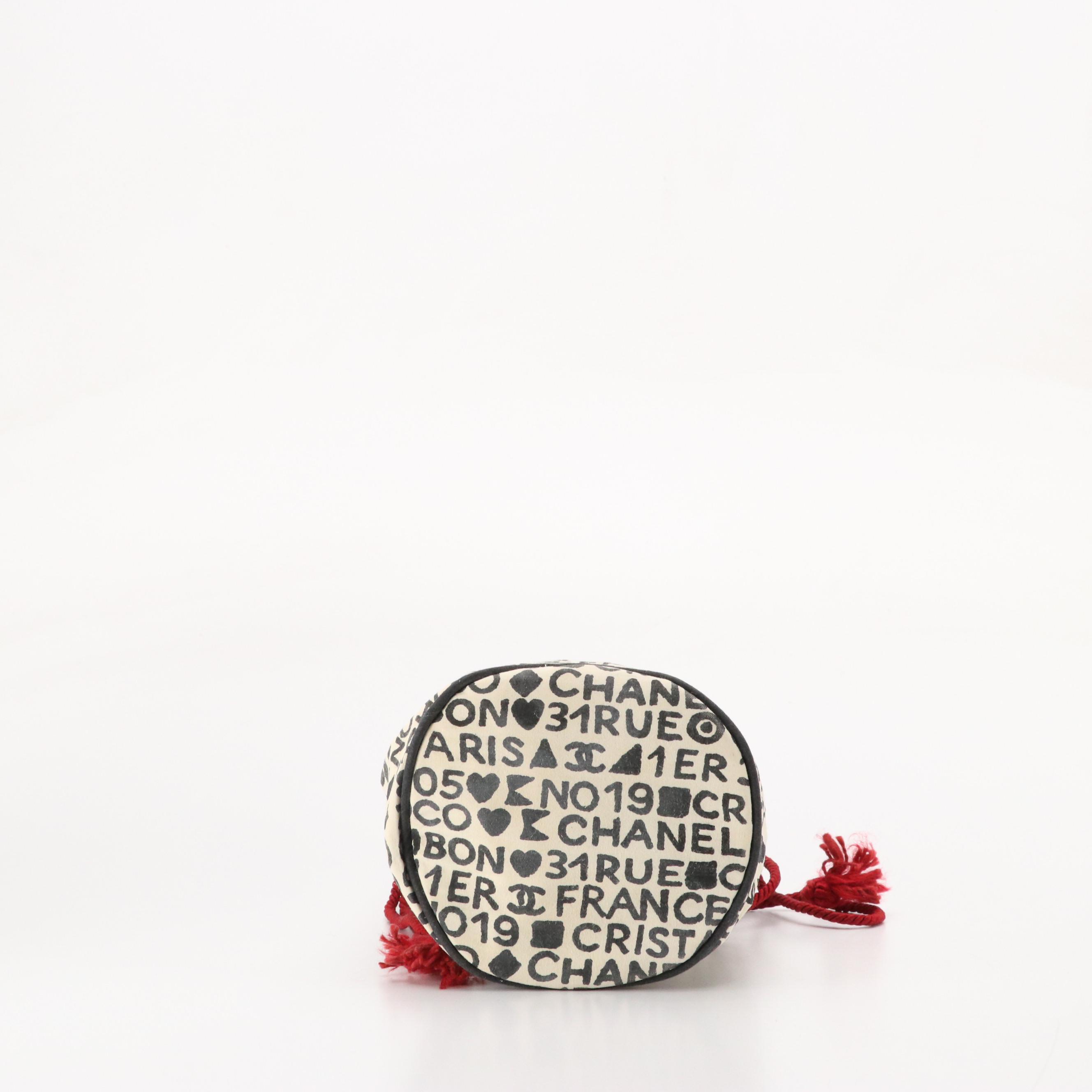 Chanel Drawstring Pouch in Black and White Rue 31 Monogram Canvas