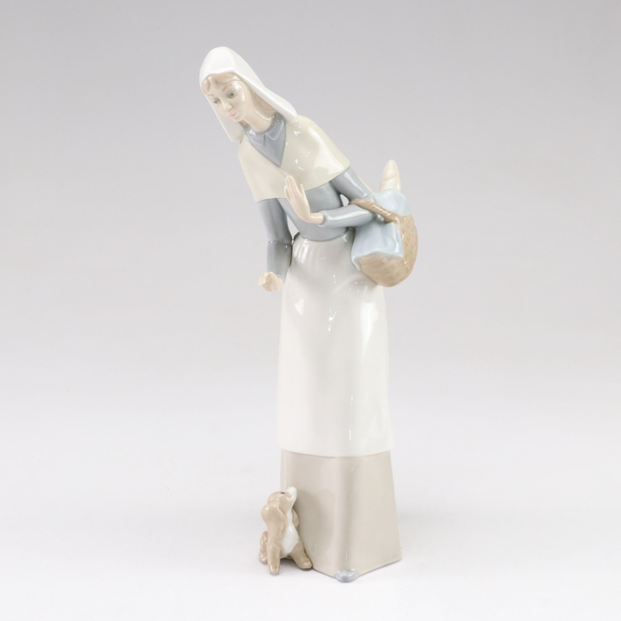 Lladró "Shepherdess with Dog" Porcelain Figurine, Late 20th C.