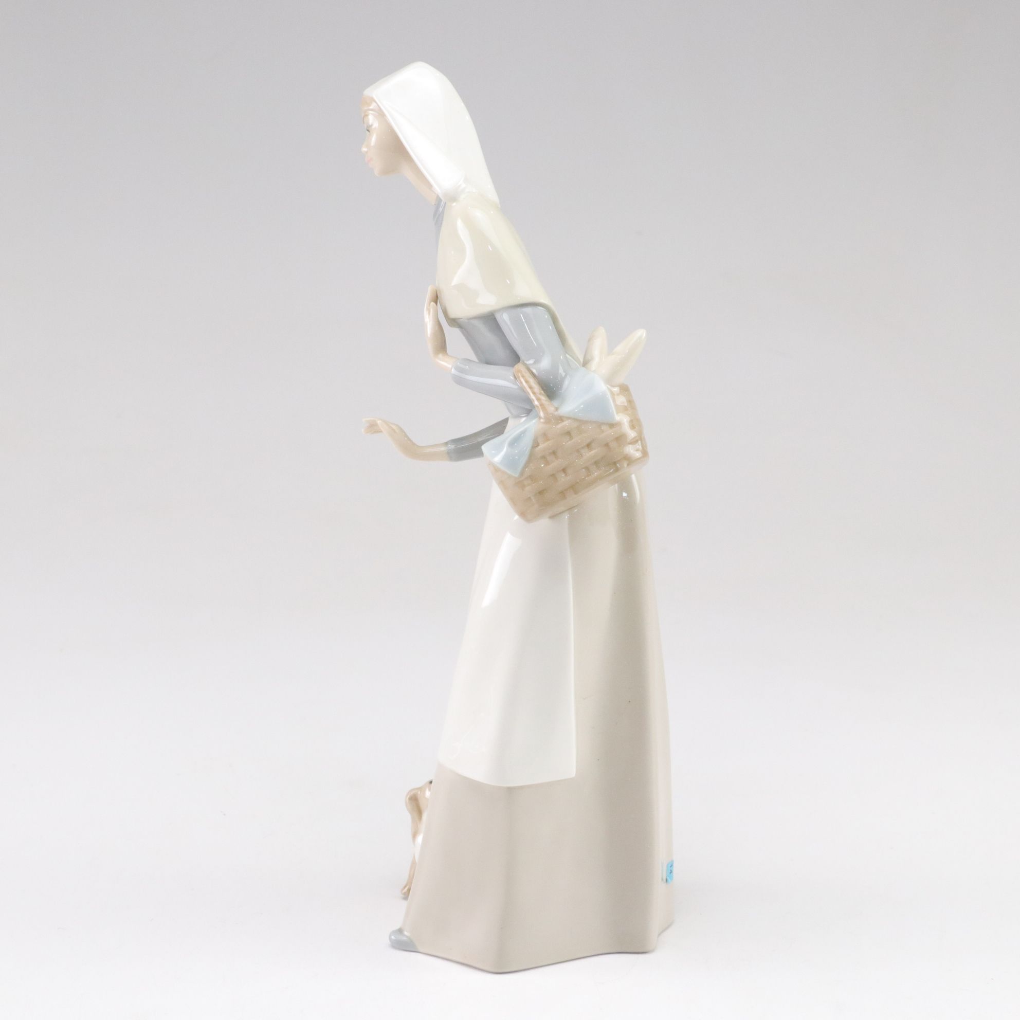 Lladró "Shepherdess with Dog" Porcelain Figurine, Late 20th C.