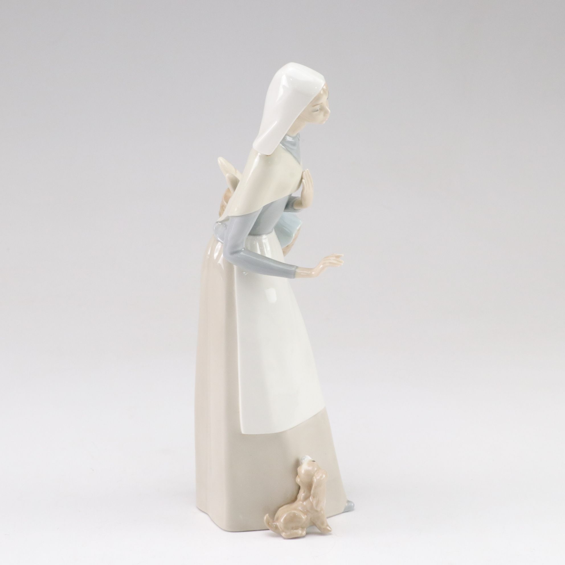 Lladró "Shepherdess with Dog" Porcelain Figurine, Late 20th C.