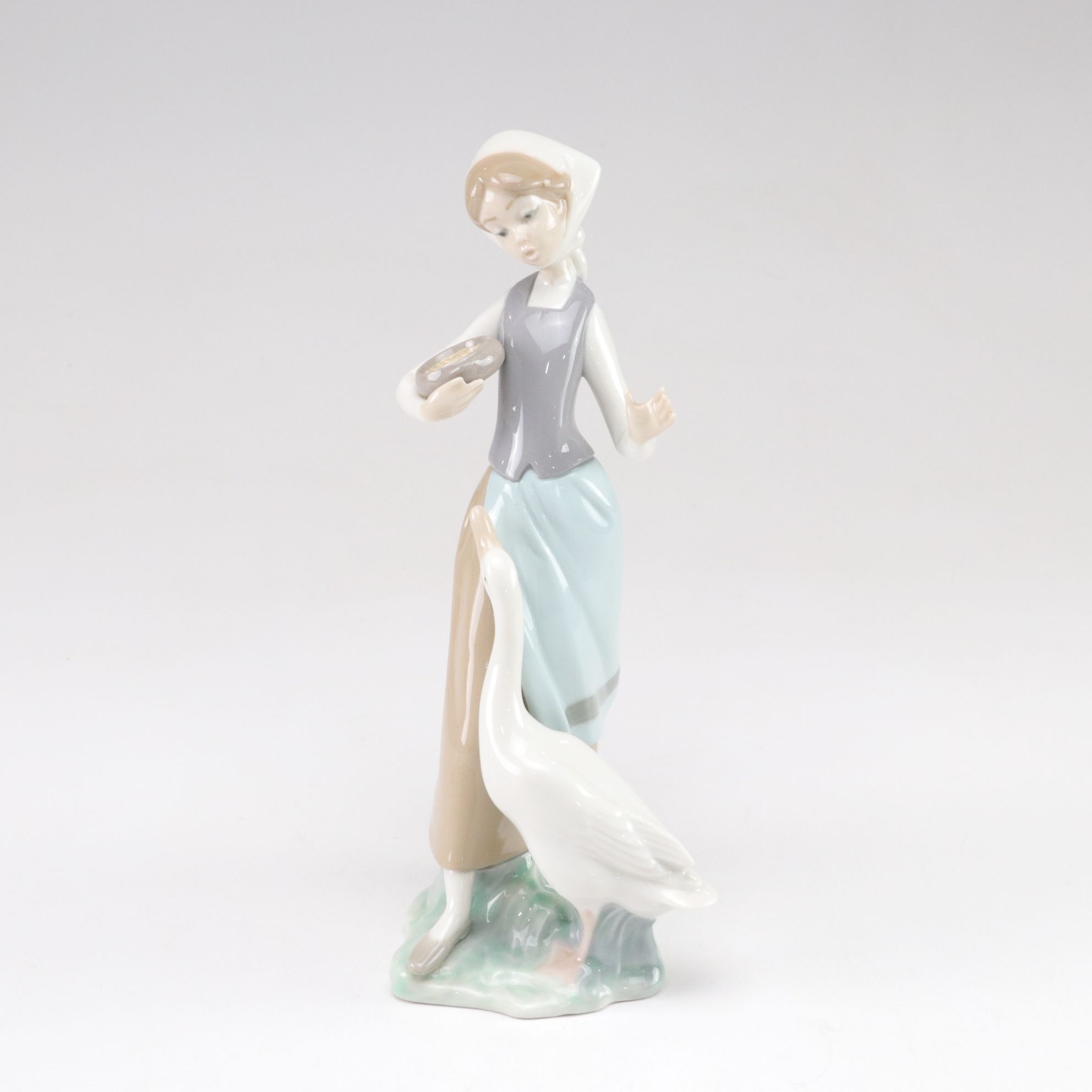 Lladró "Follow Me" and "Girl with Ducks" Porcelain Figurines