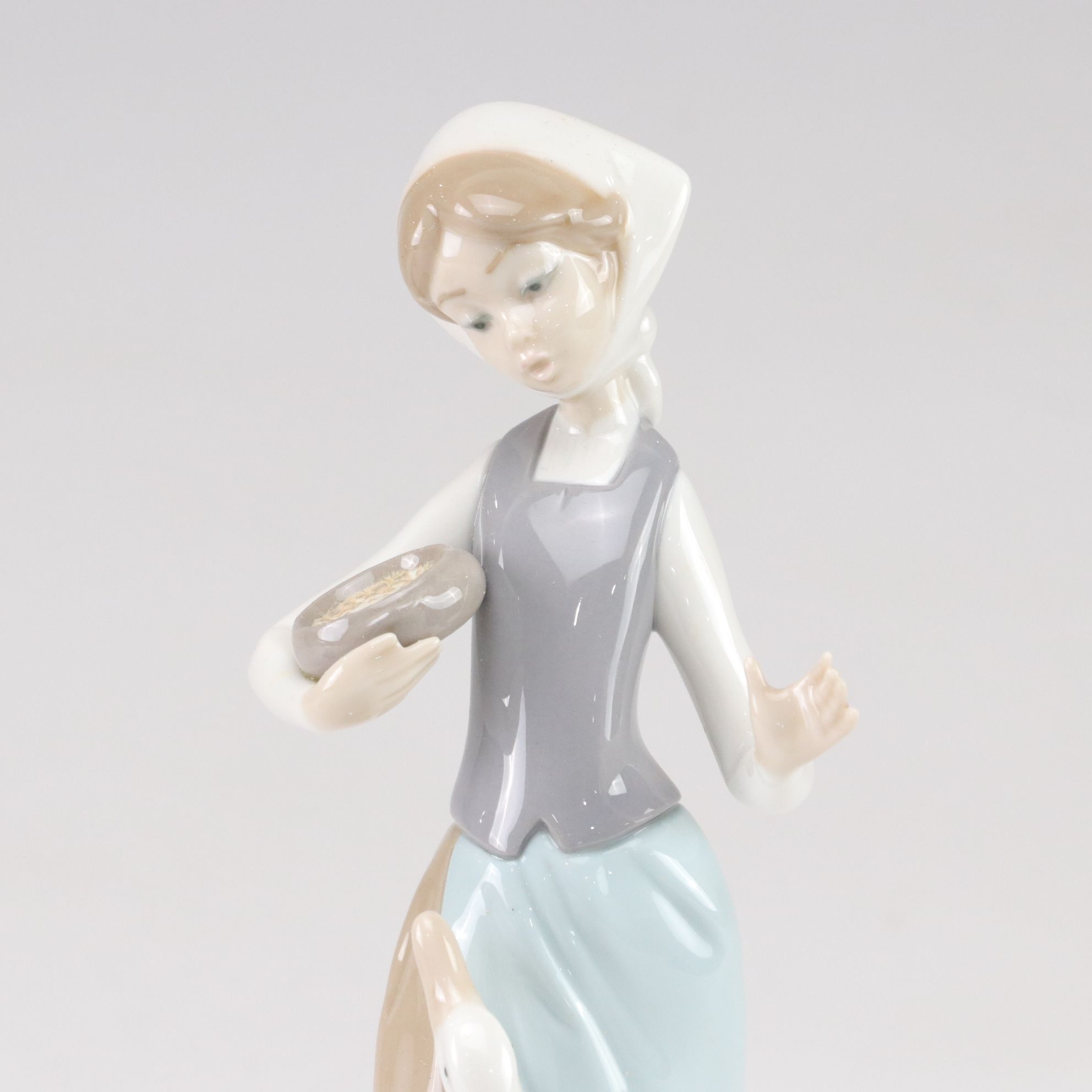 Lladró "Follow Me" and "Girl with Ducks" Porcelain Figurines