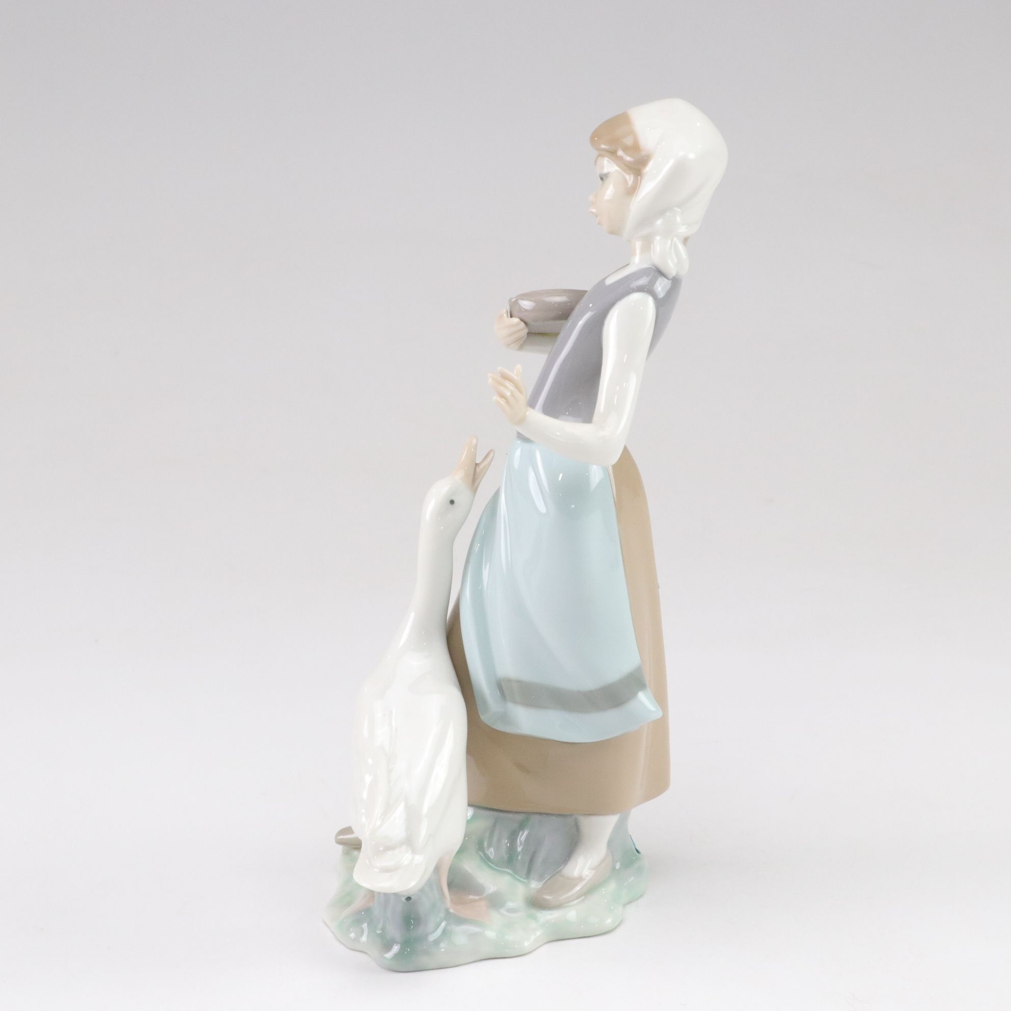 Lladró "Follow Me" and "Girl with Ducks" Porcelain Figurines