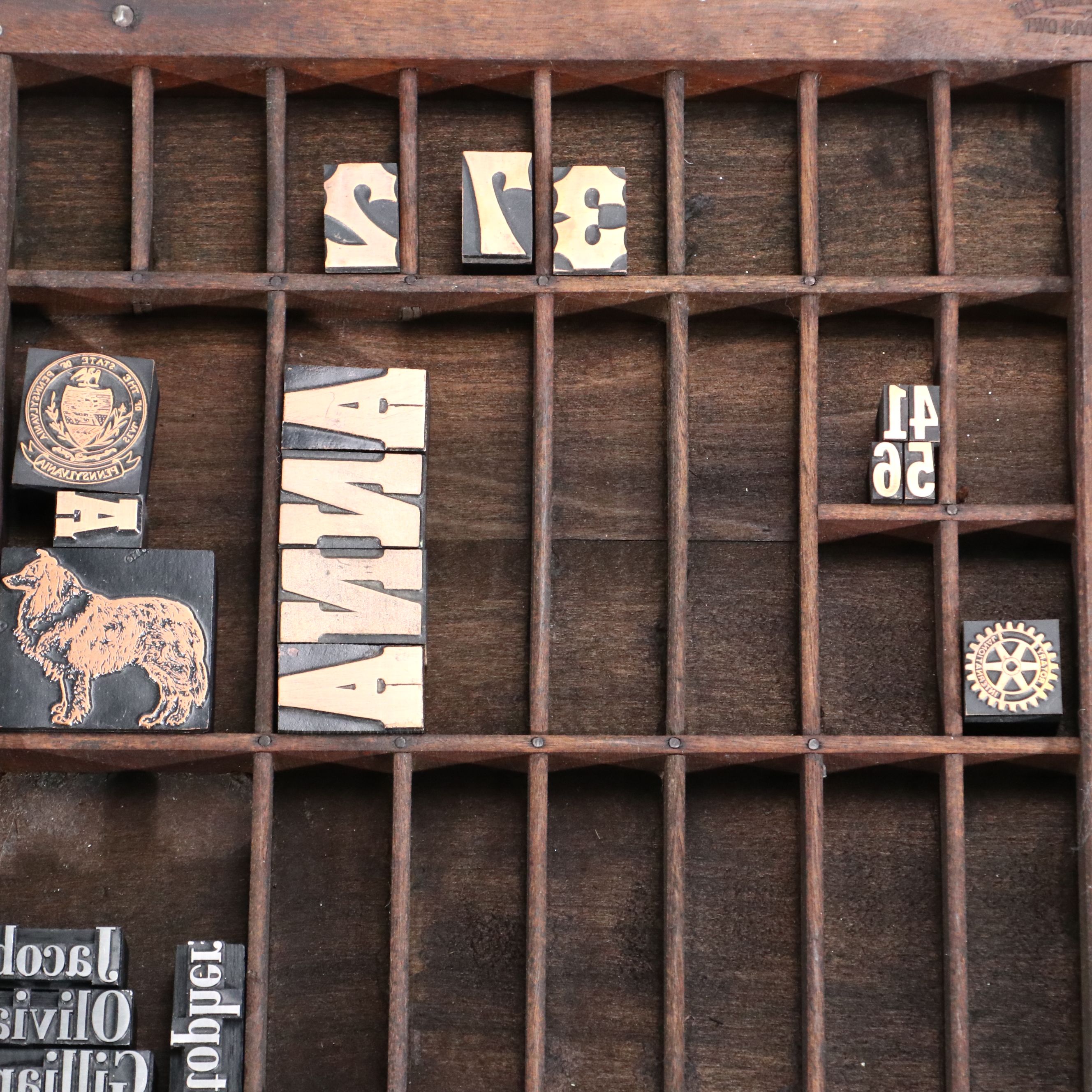 Antique Printer's Typeset Tray with Collection of Stamps