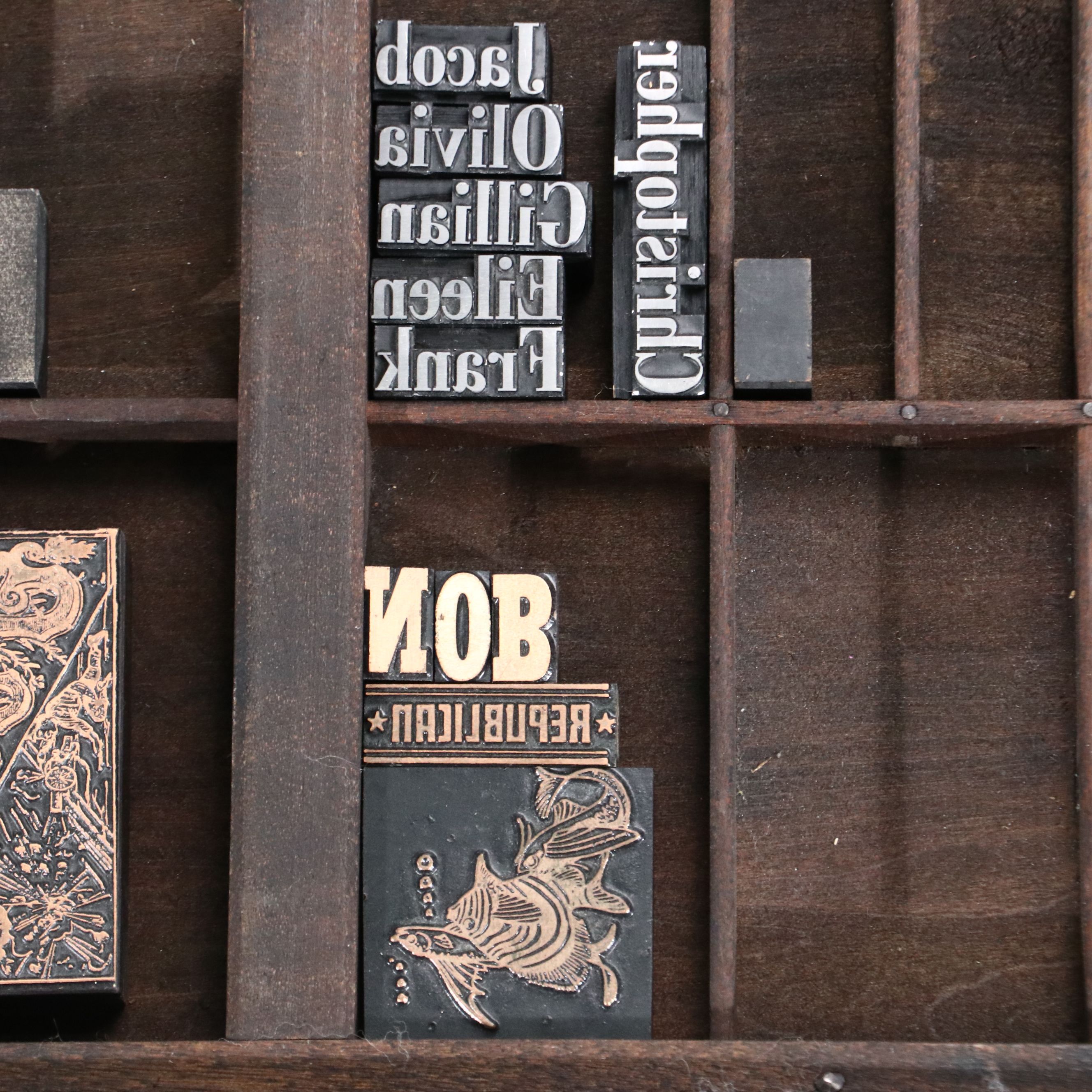 Antique Printer's Typeset Tray with Collection of Stamps