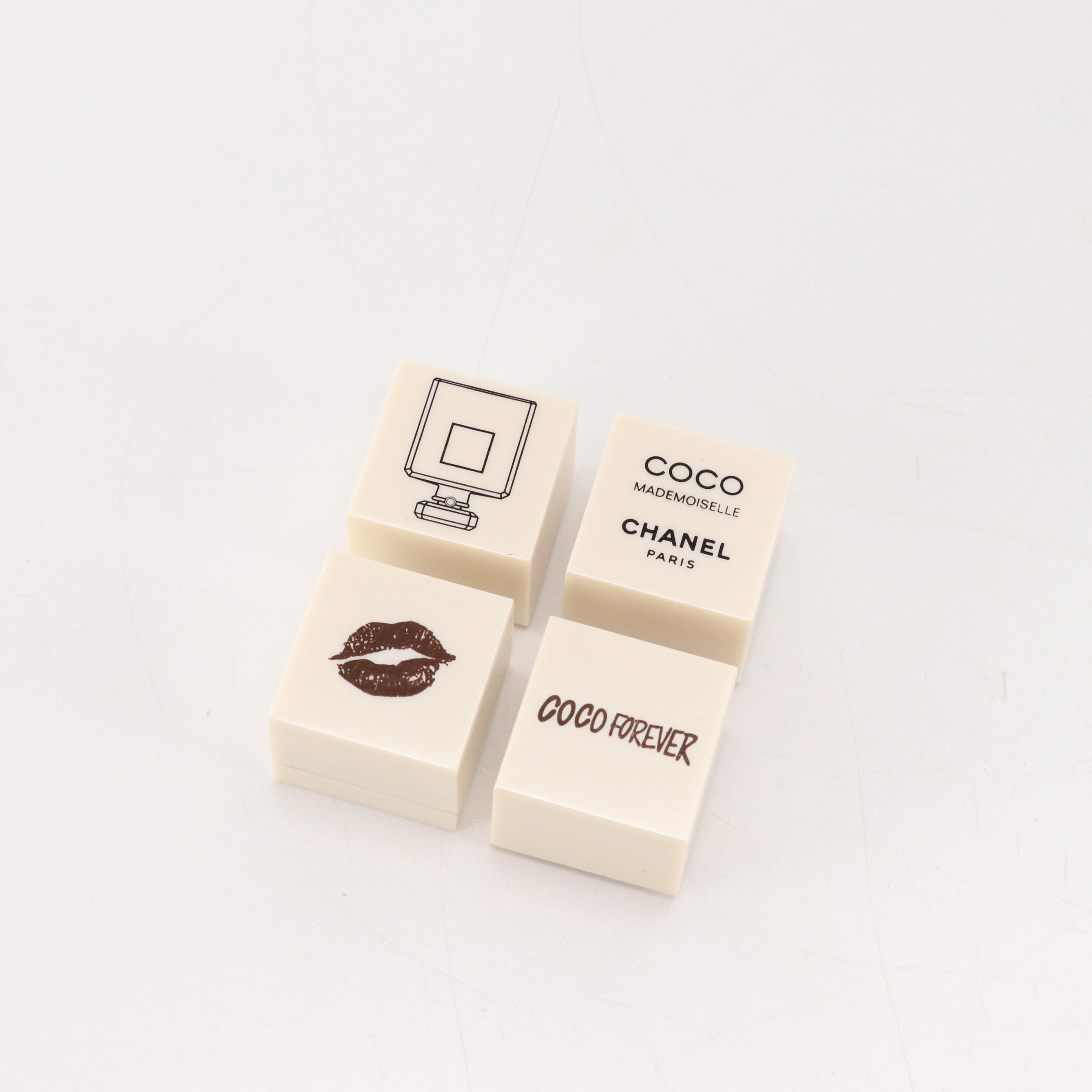 Chanel Parfums and Prada Beauty Promotional Stamp Sets