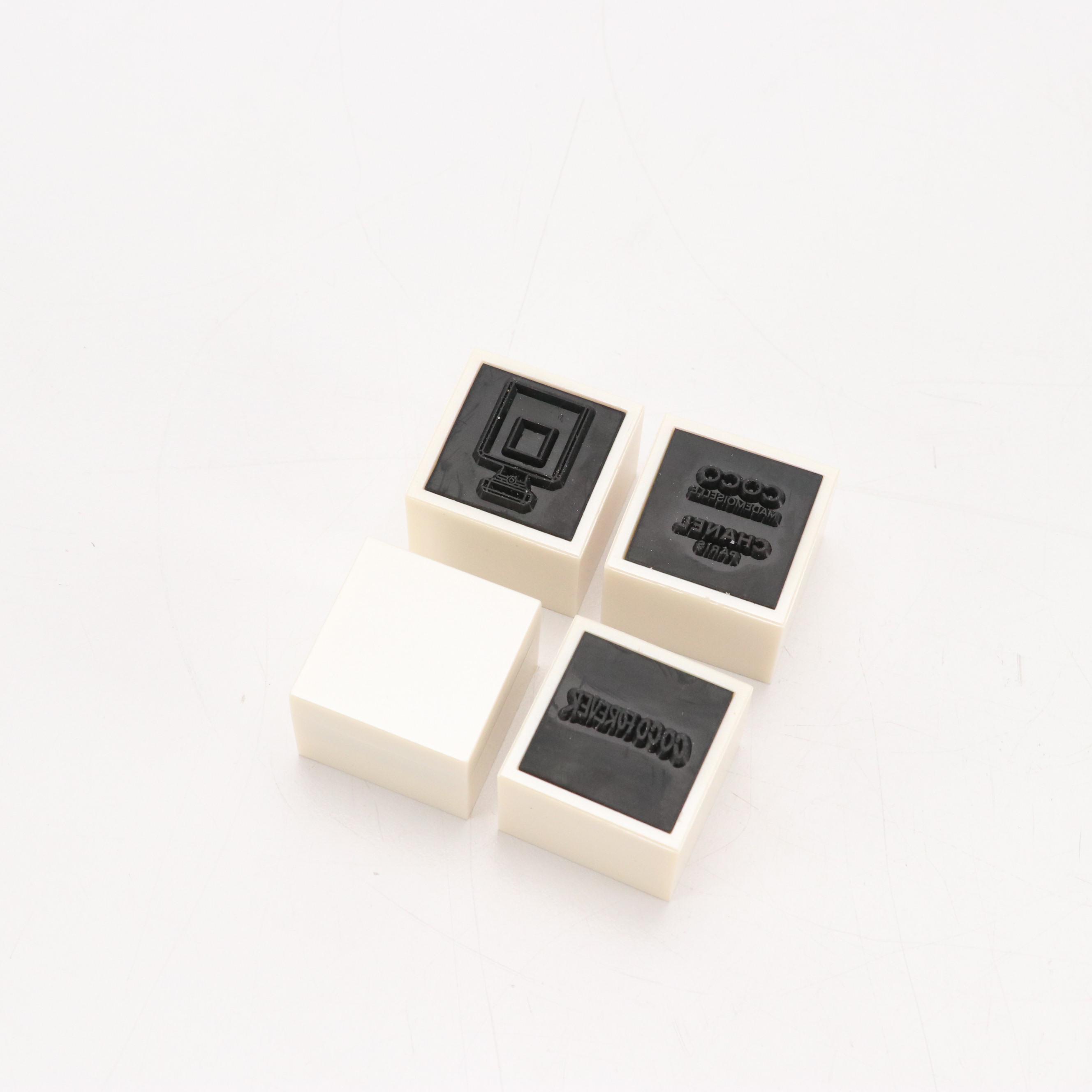 Chanel Parfums and Prada Beauty Promotional Stamp Sets