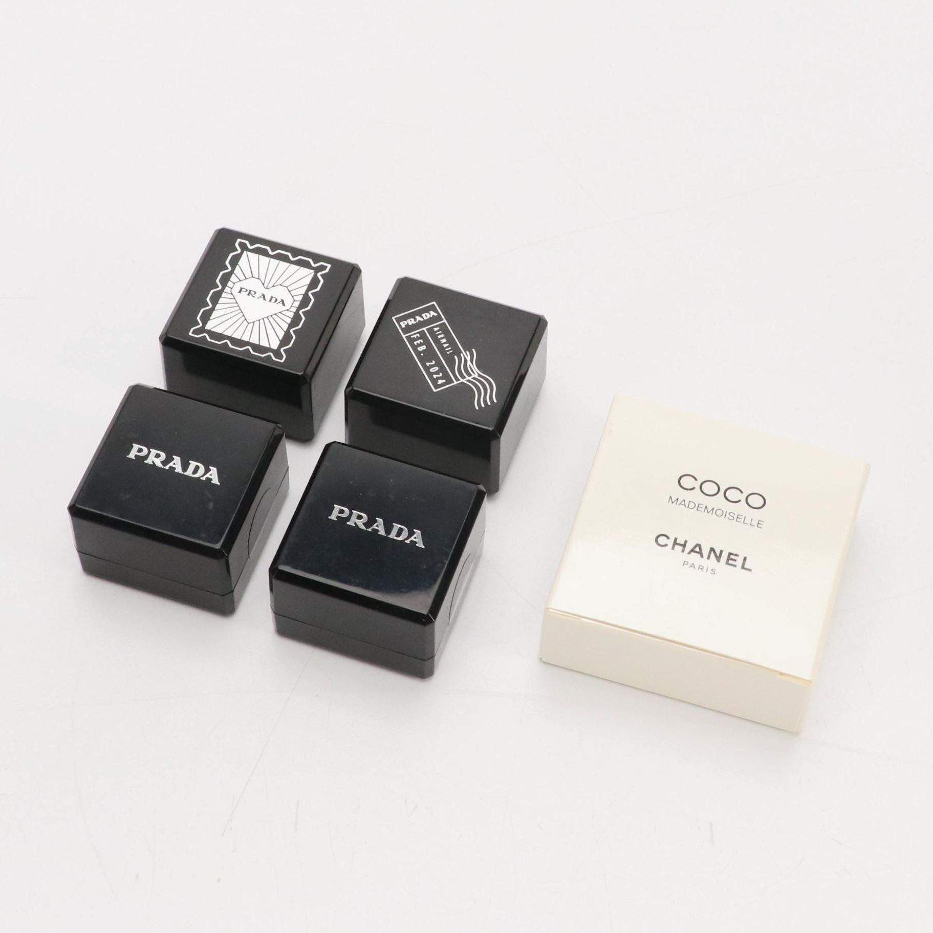 Chanel Parfums and Prada Beauty Promotional Stamp Sets