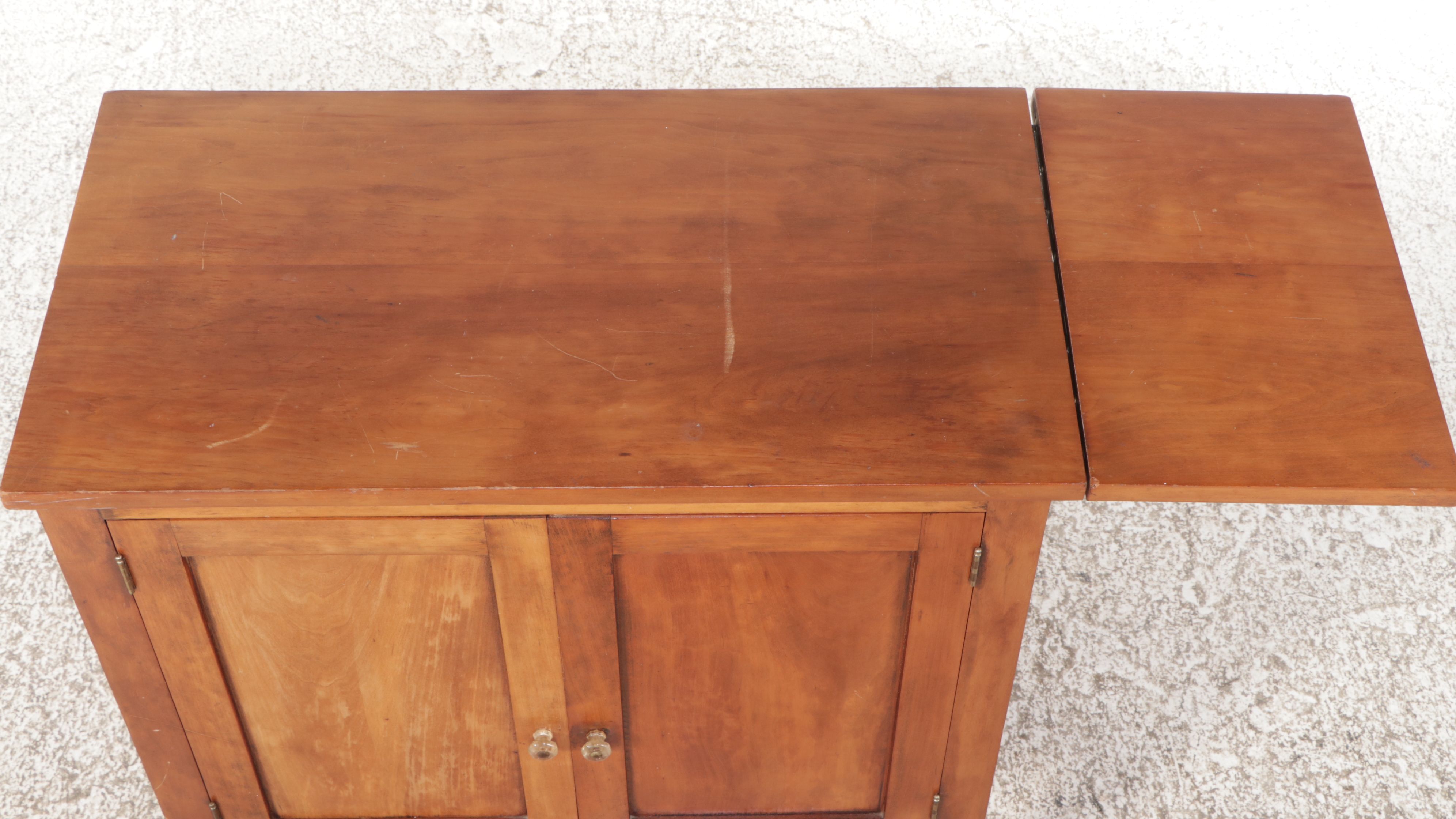 American Primitive Style Cherry Finish Kitchen Cabinet with Drop Leaf