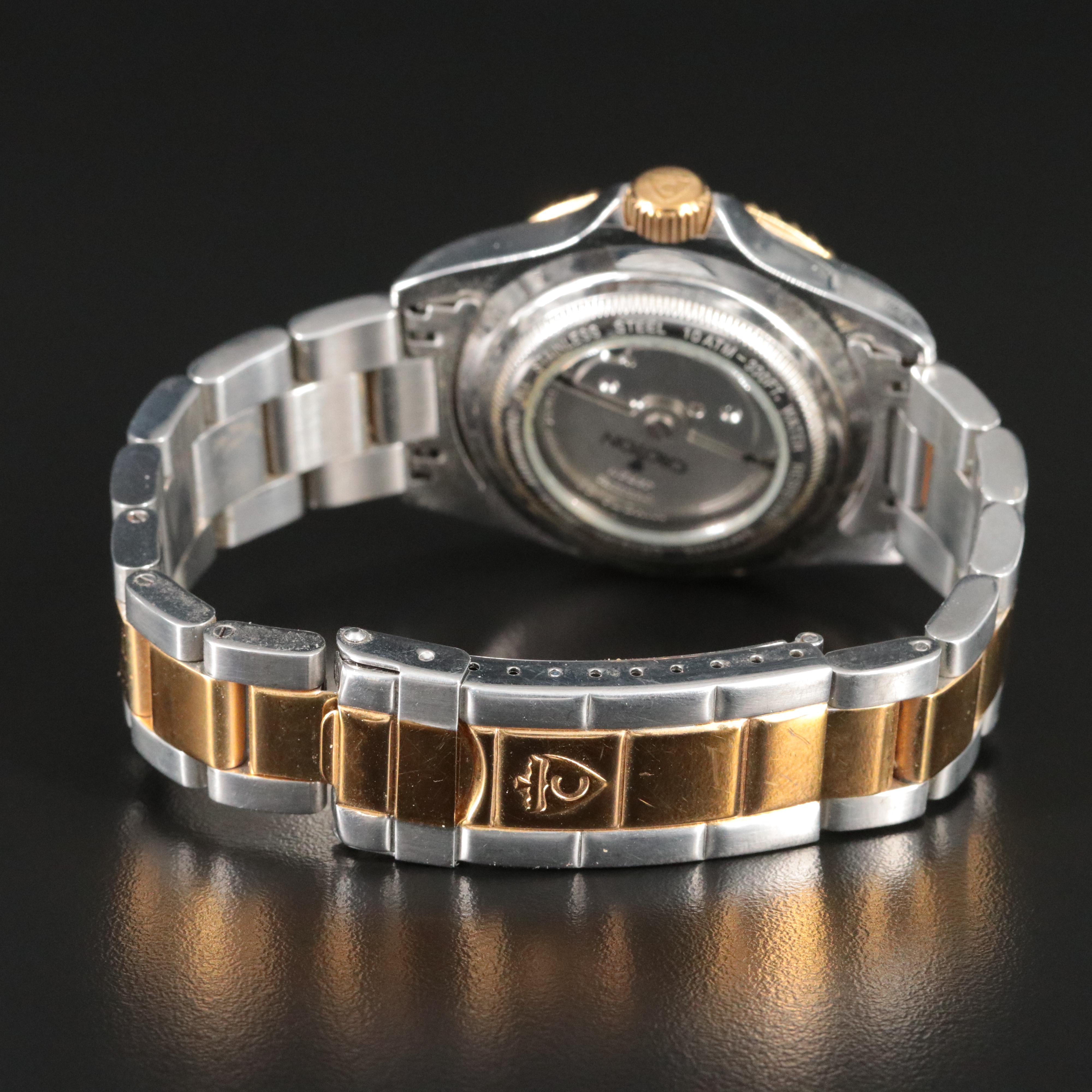 Croton Two Tone Green Wave Dial Date Watch