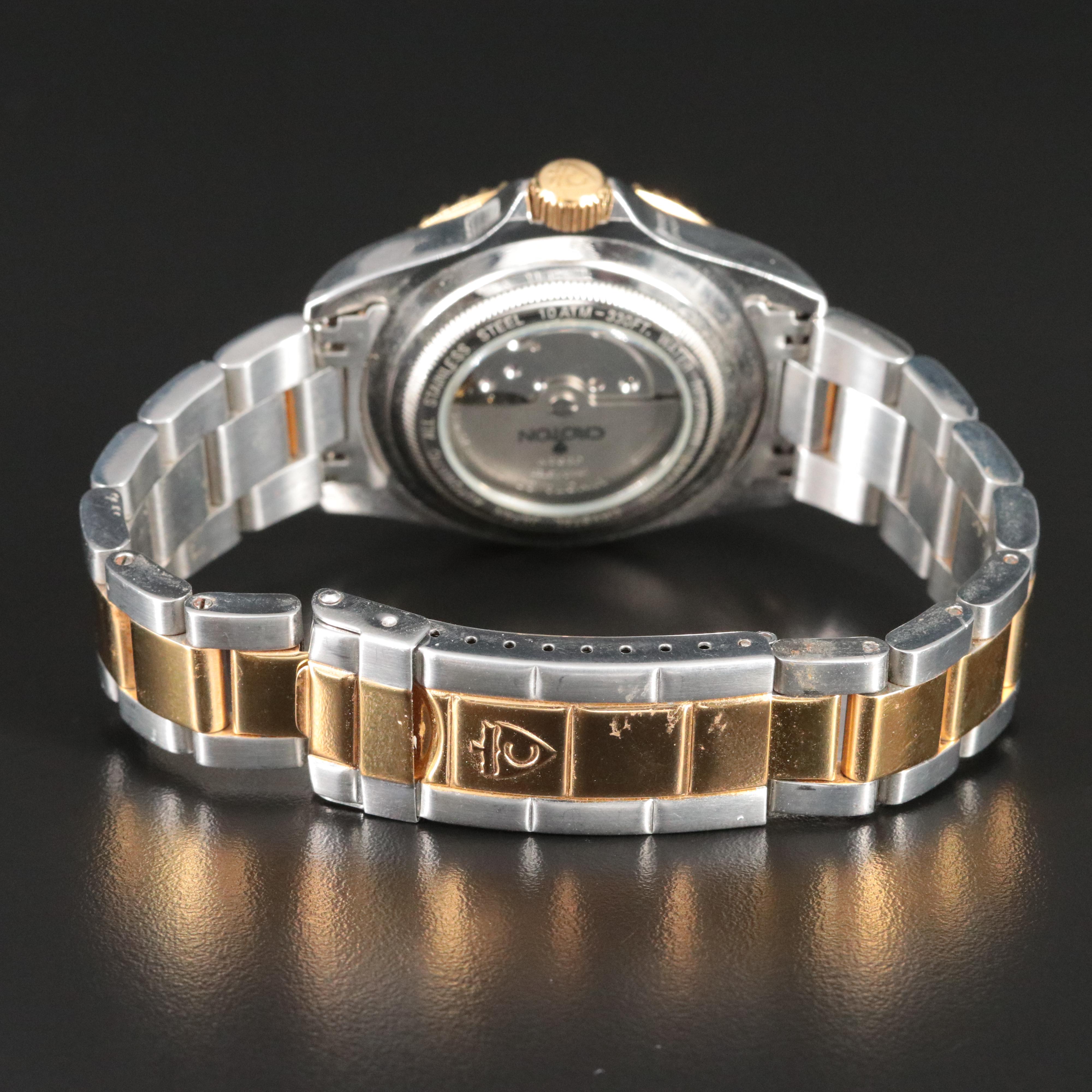 Croton Two Tone Dark Green Wave Dial Watch