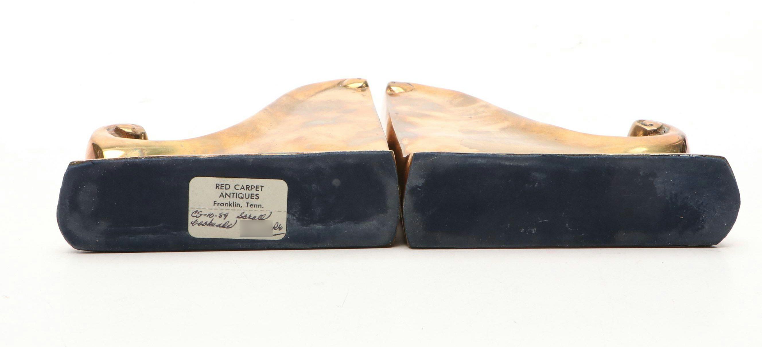 Cast Iron Peacock Doorstop with Brass Bookends