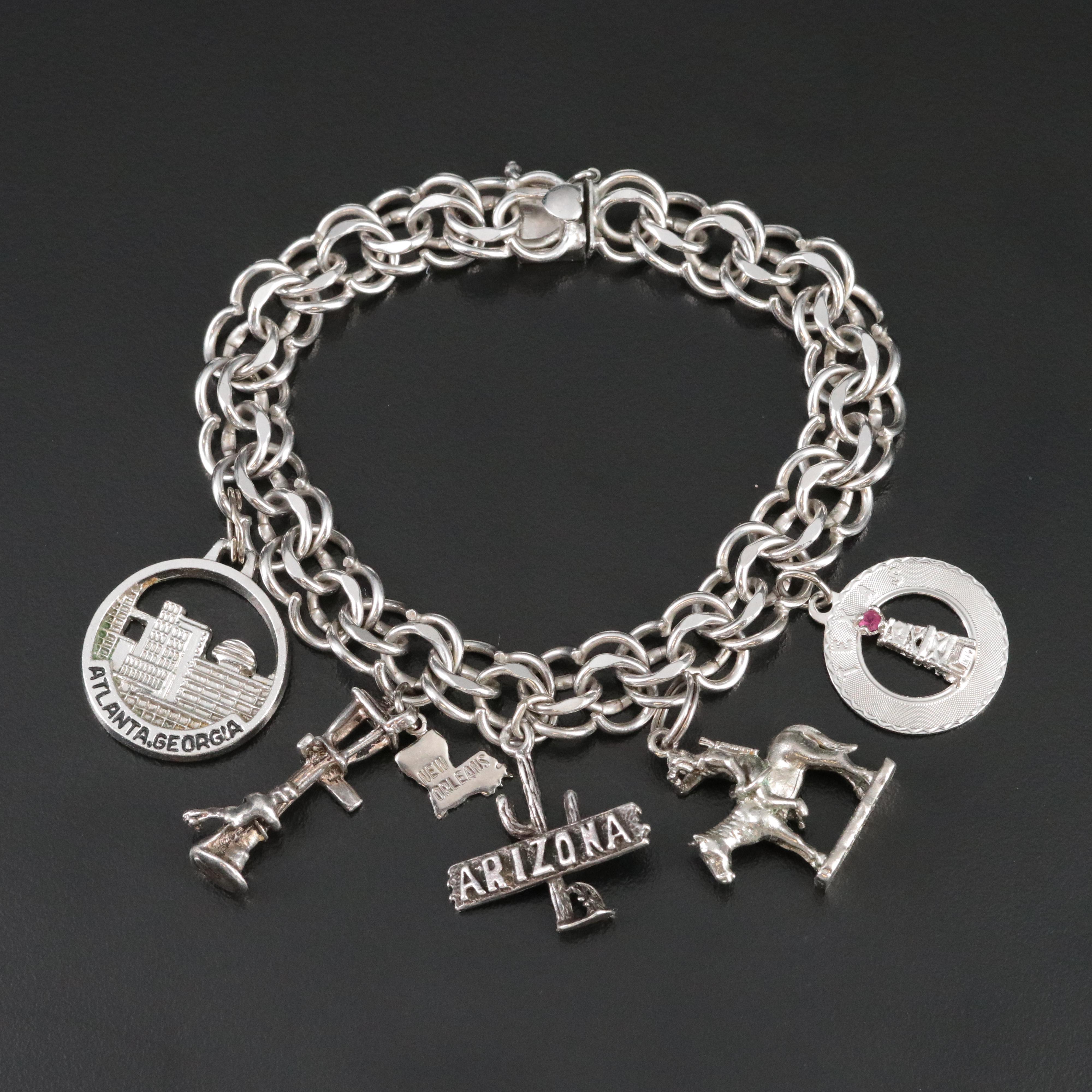 Sterling Charm Bracelet Featuring Sterling and 800 Silver Charms