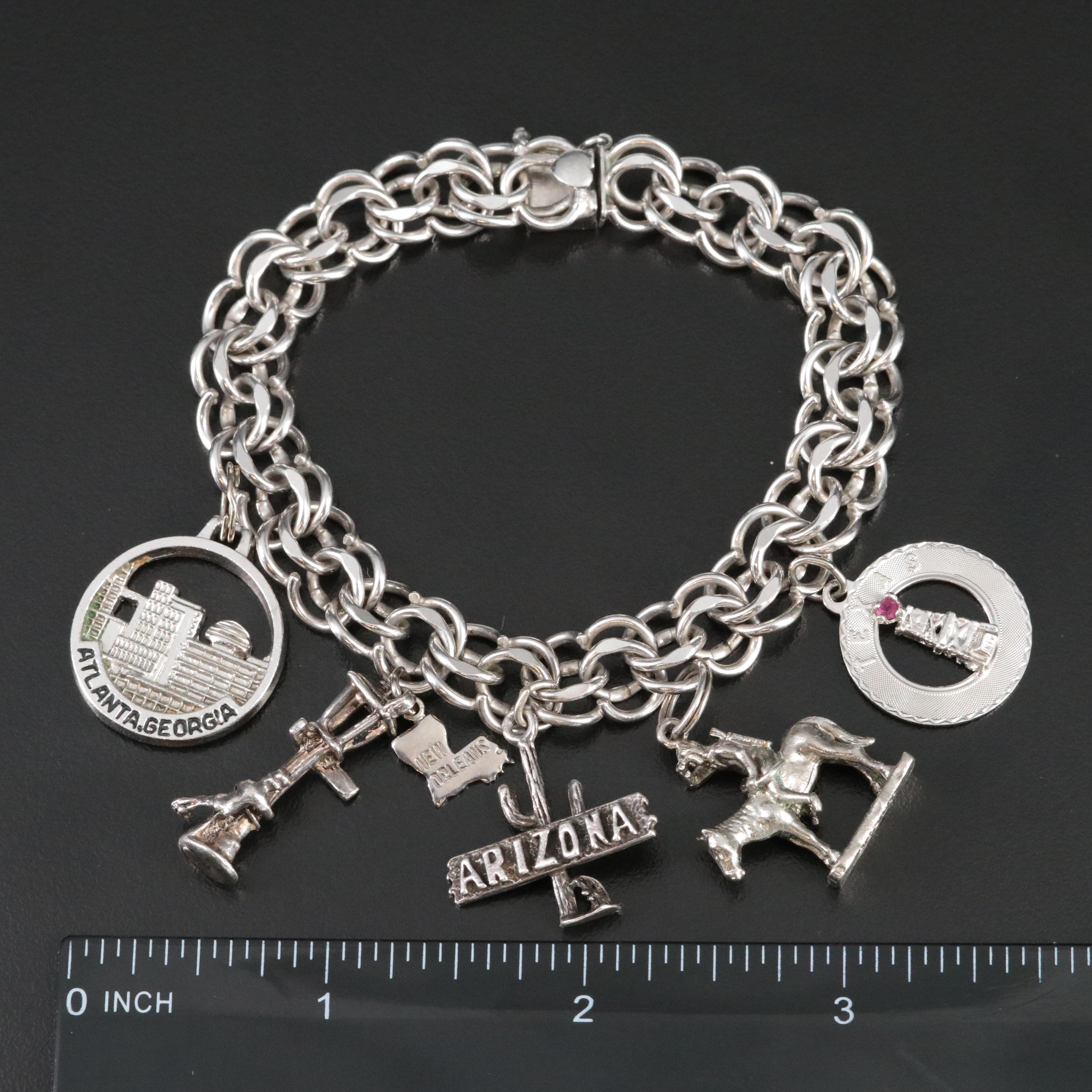 Sterling Charm Bracelet Featuring Sterling and 800 Silver Charms