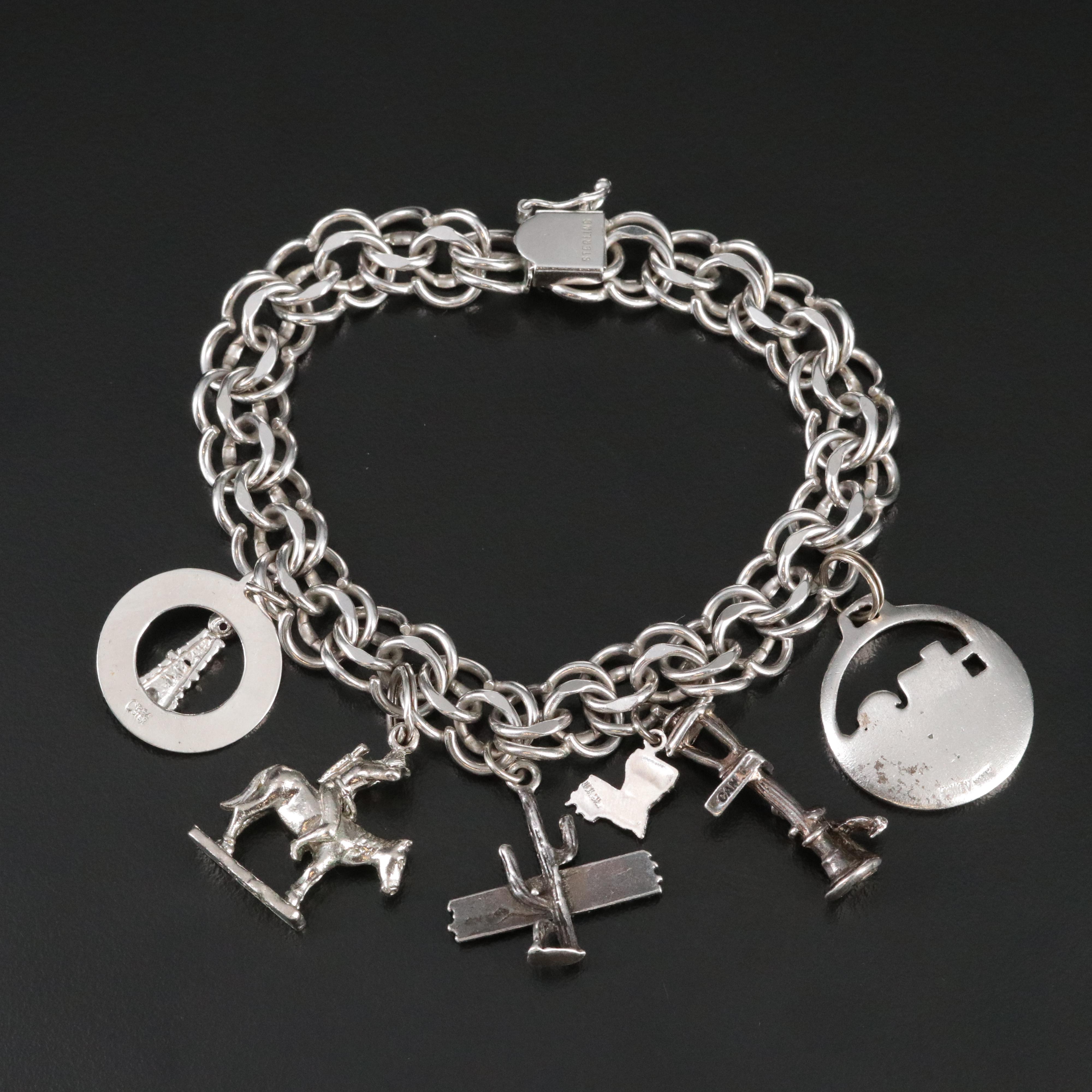 Sterling Charm Bracelet Featuring Sterling and 800 Silver Charms