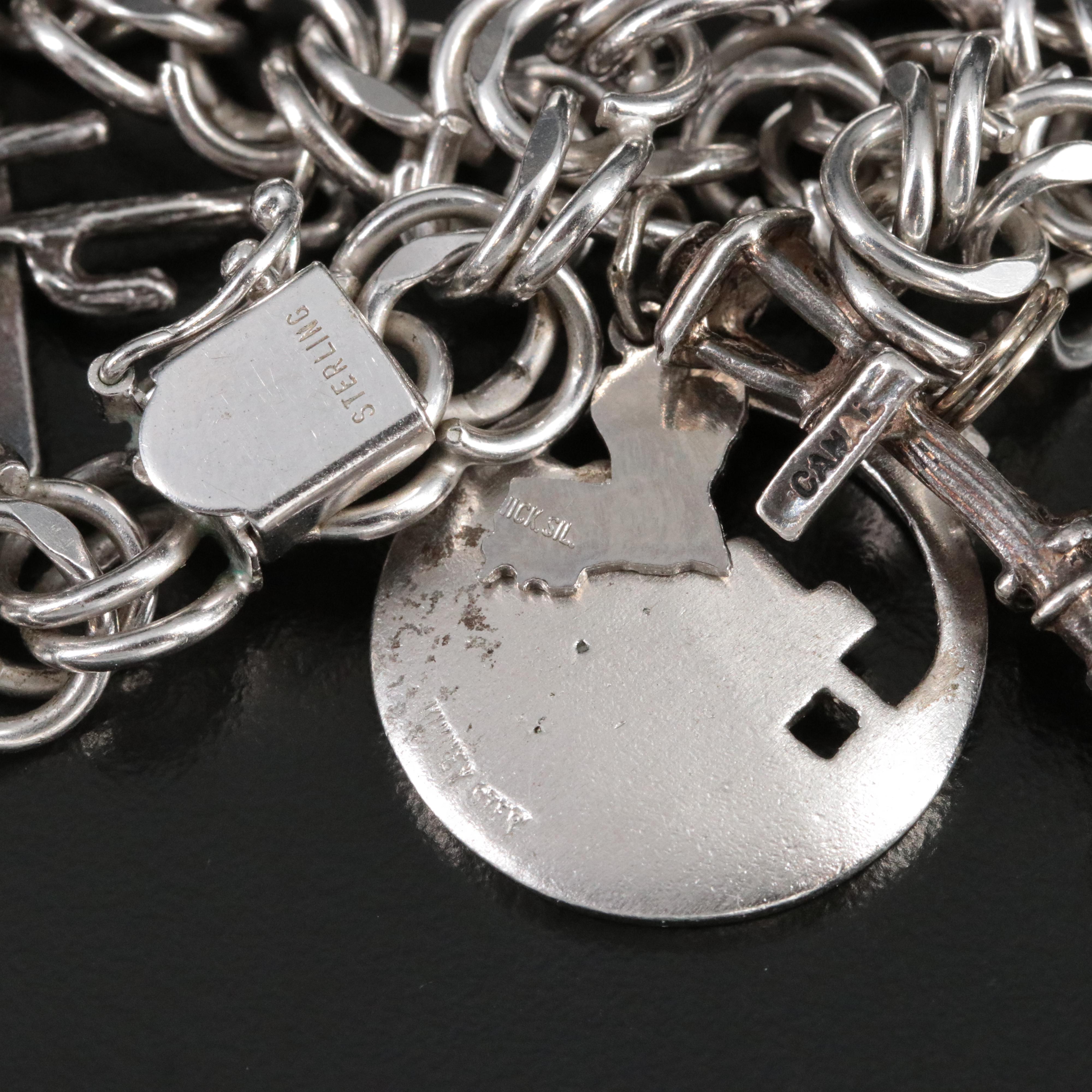 Sterling Charm Bracelet Featuring Sterling and 800 Silver Charms