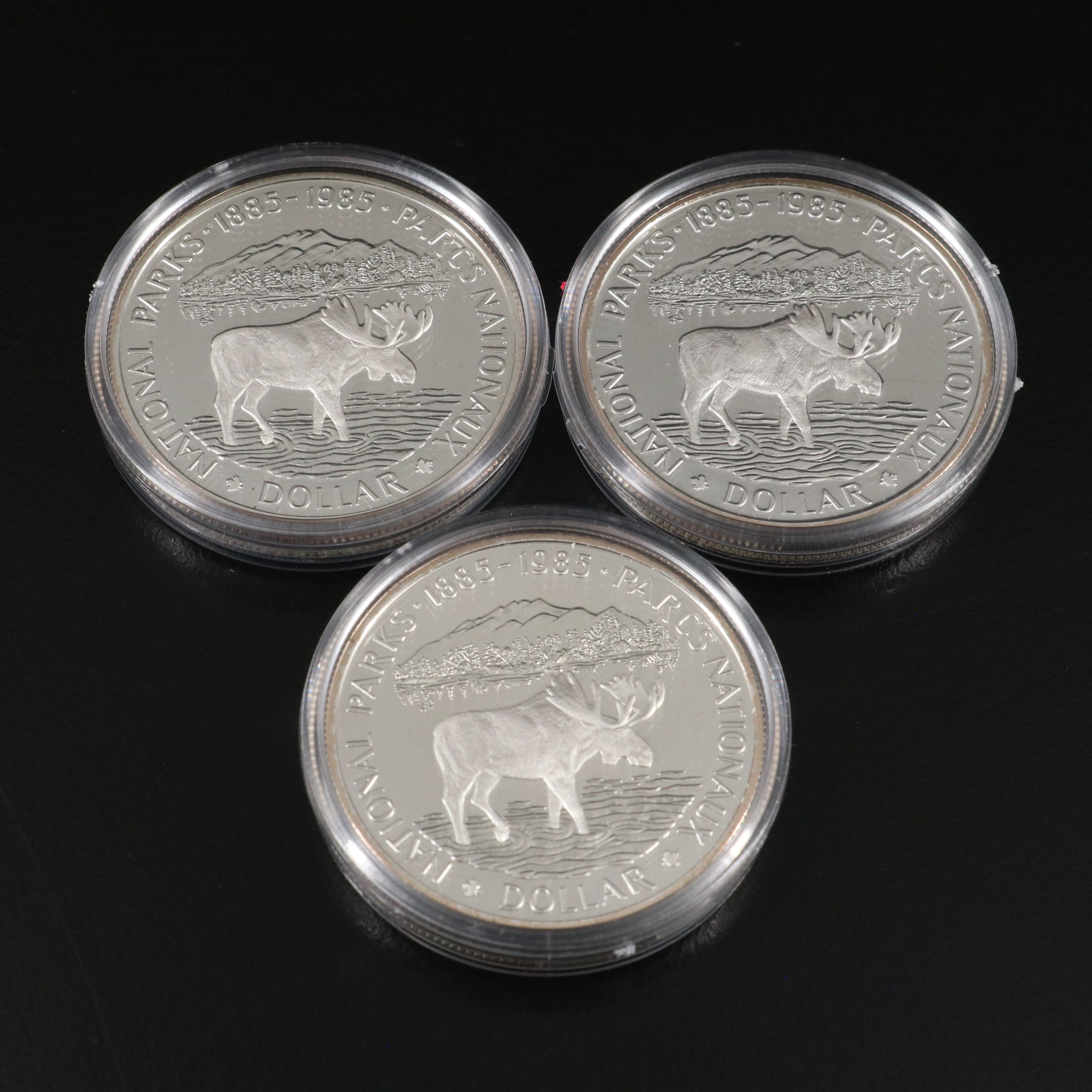 Five 1985 Canada Silver Proof Commemorative Dollars
