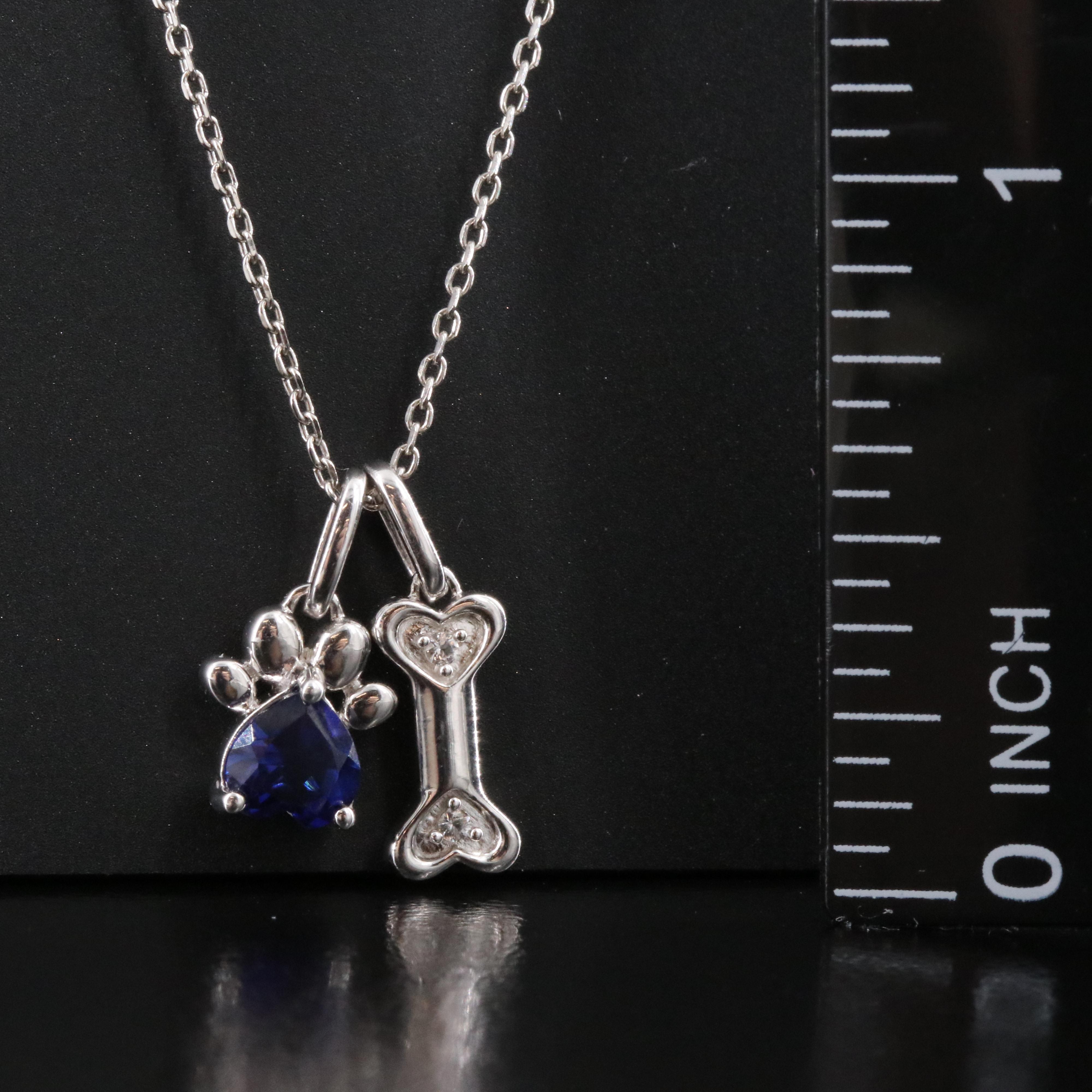 Sterling Blue and White Sapphire Paw Print and Bone Pendant Necklace