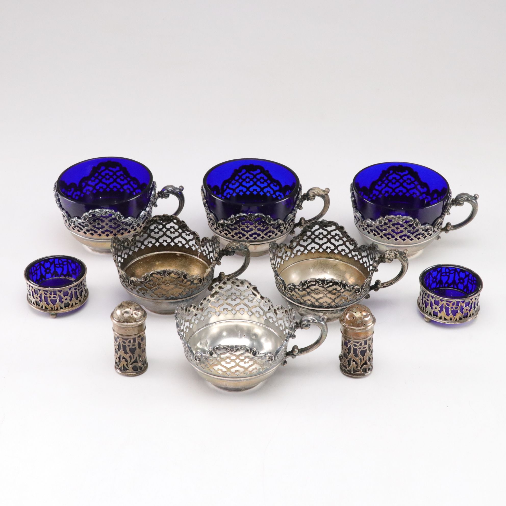 Sterling Silver Cup, Master Salt, and Shaker Holders with Cobalt Glass Inserts