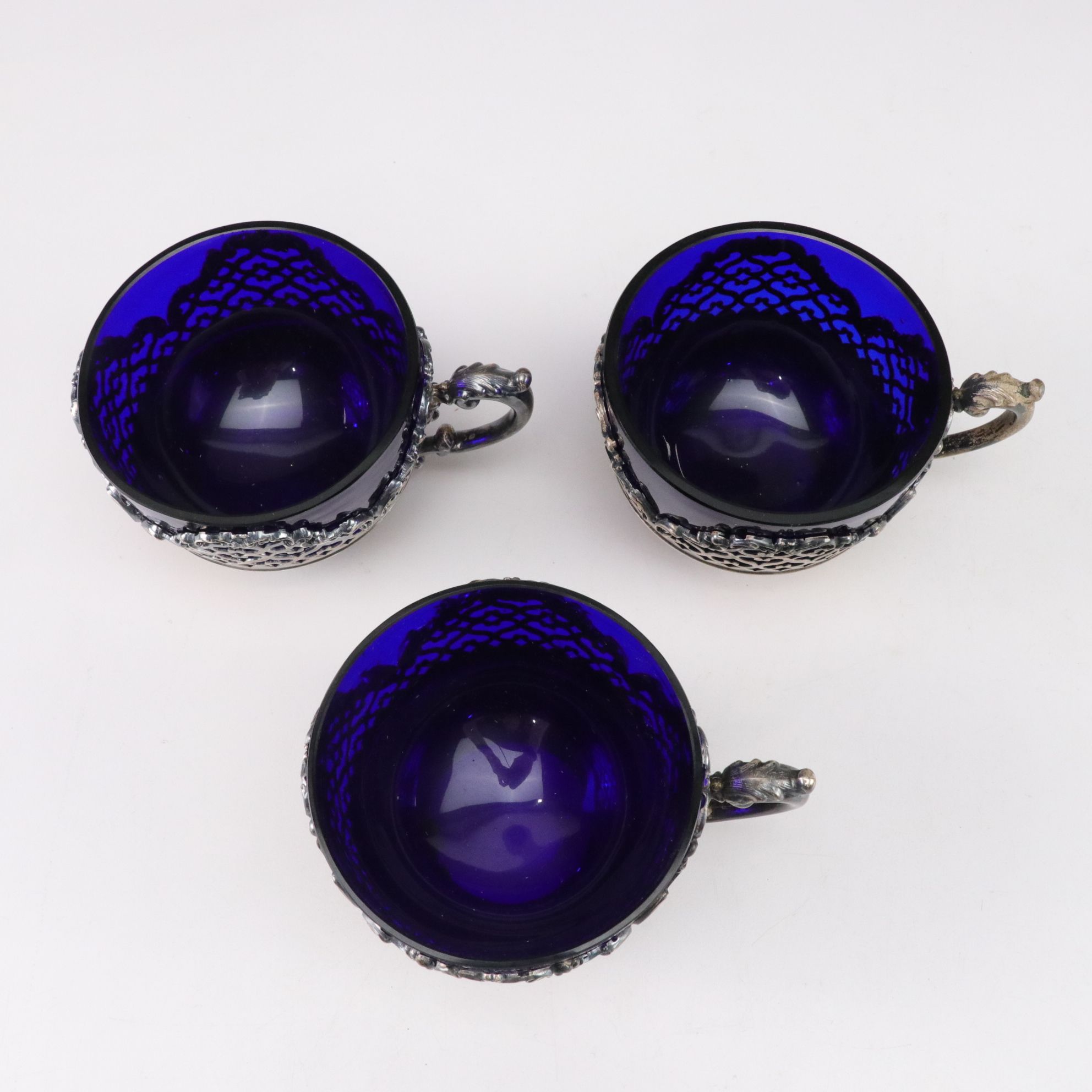 Sterling Silver Cup, Master Salt, and Shaker Holders with Cobalt Glass Inserts