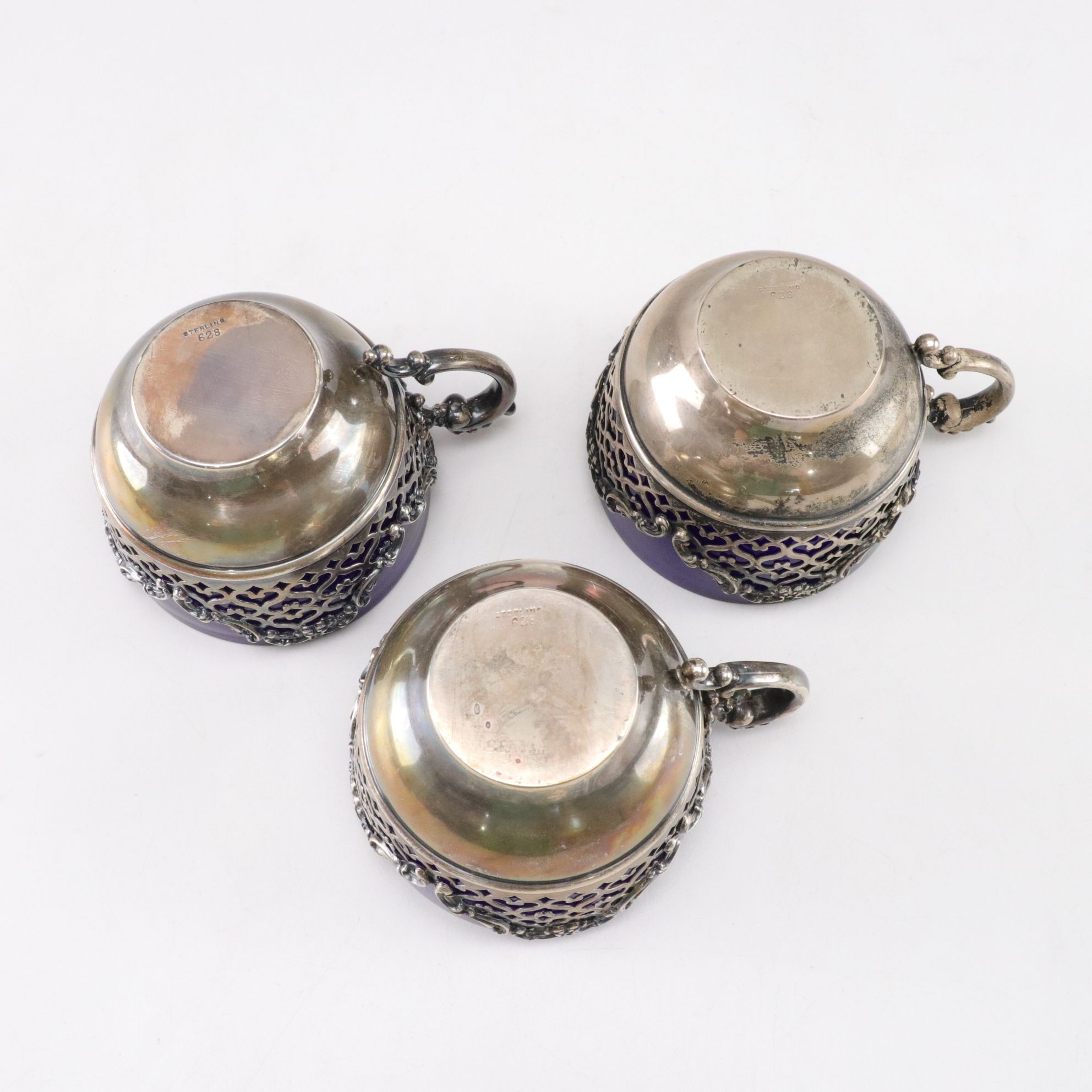 Sterling Silver Cup, Master Salt, and Shaker Holders with Cobalt Glass Inserts