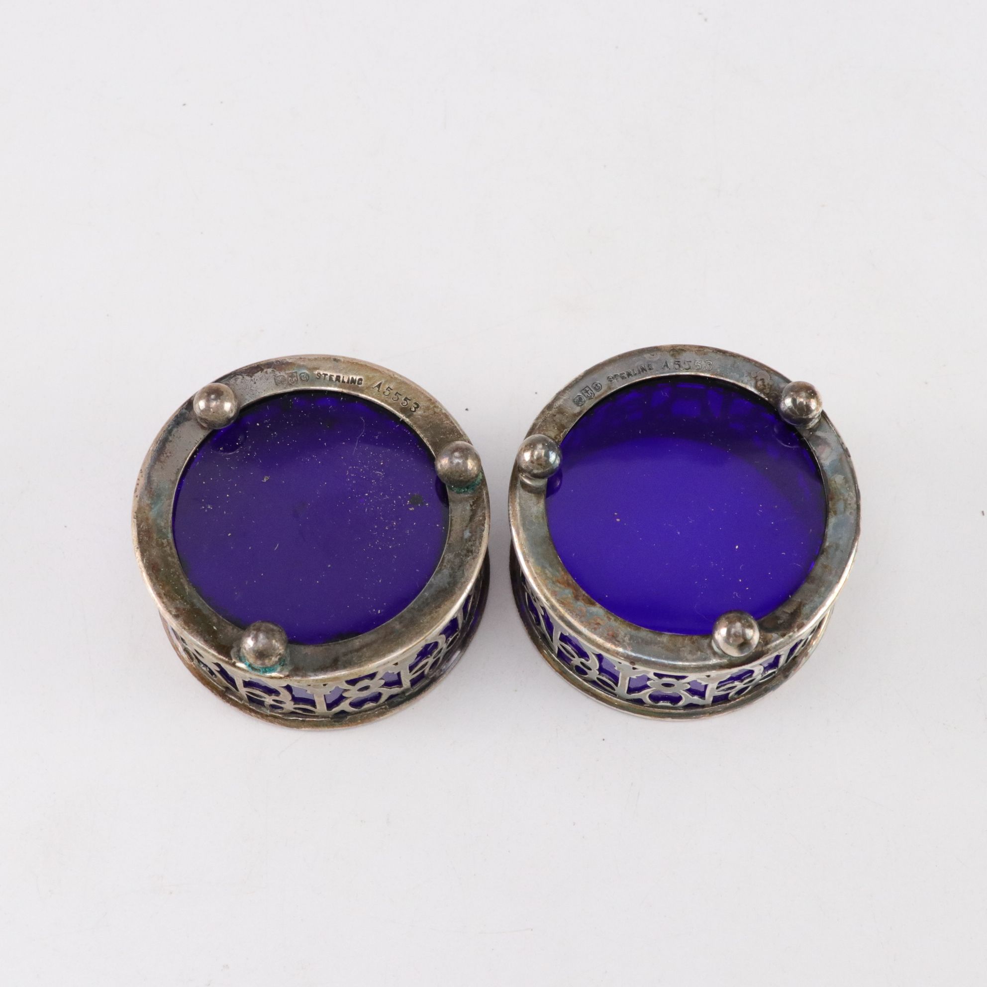 Sterling Silver Cup, Master Salt, and Shaker Holders with Cobalt Glass Inserts