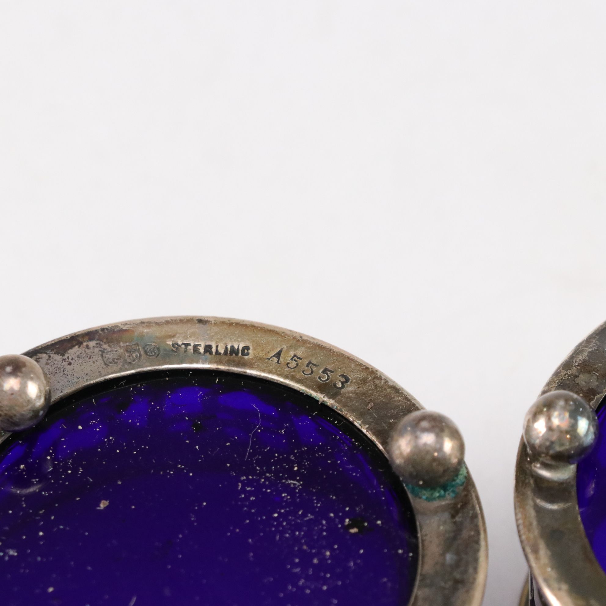 Sterling Silver Cup, Master Salt, and Shaker Holders with Cobalt Glass Inserts