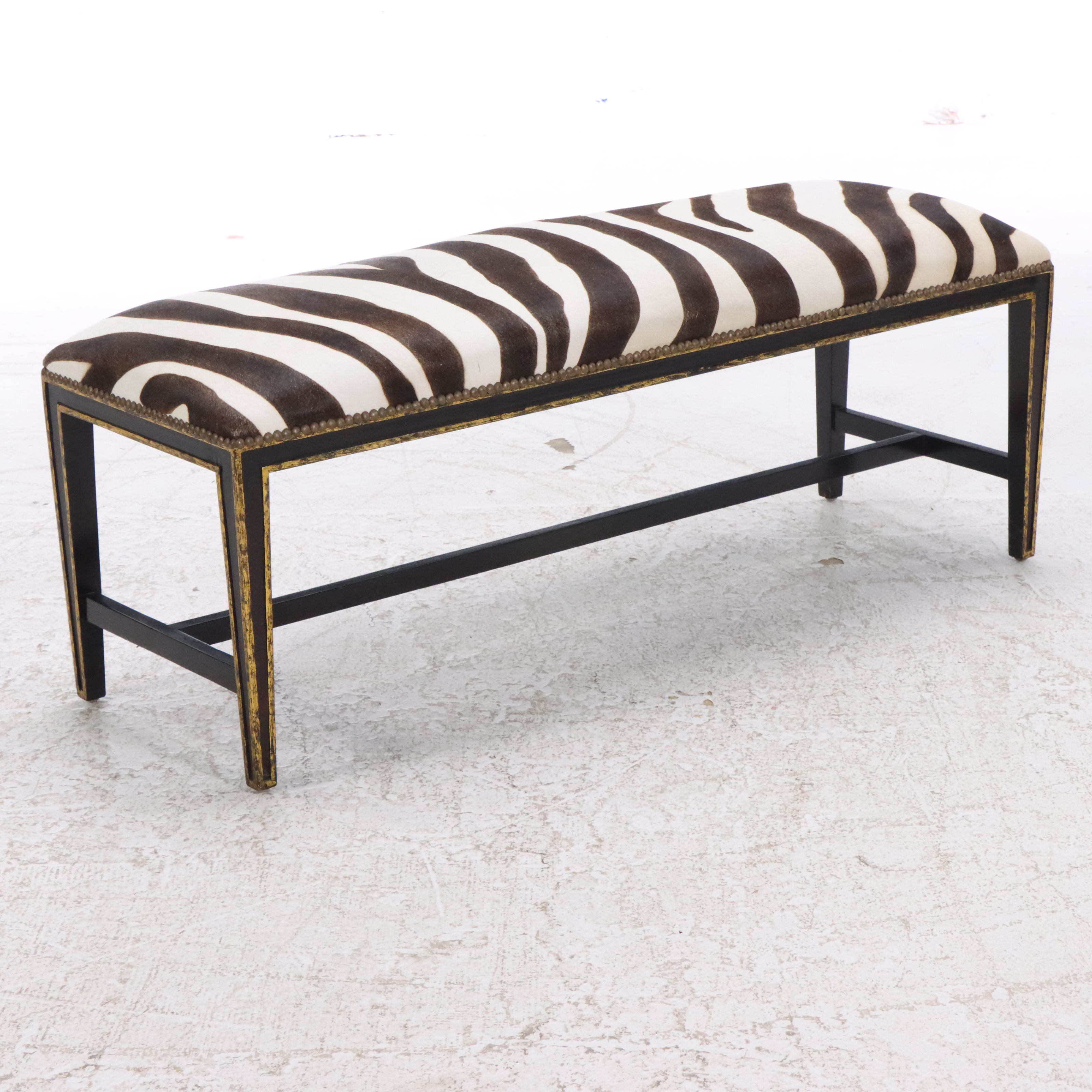 Black and Parcel Gilt Painted Bed Bench with Faux Zebra Hide