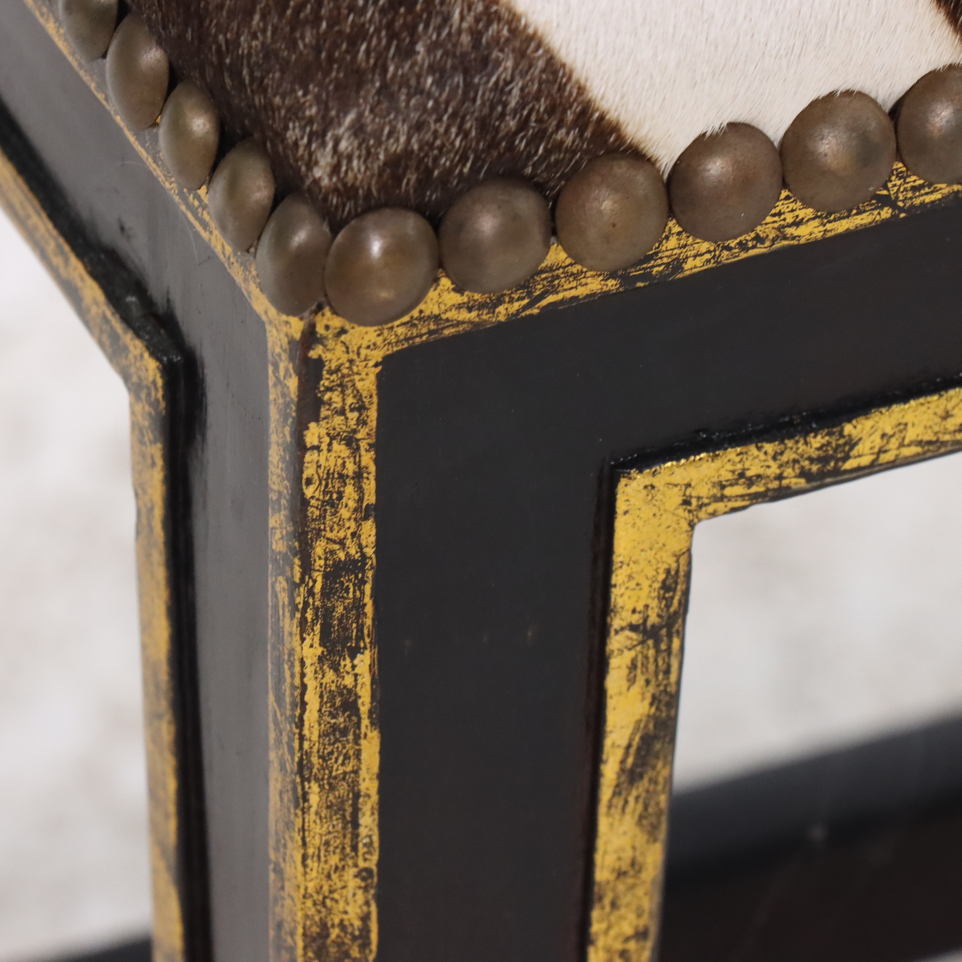 Black and Parcel Gilt Painted Bed Bench with Faux Zebra Hide