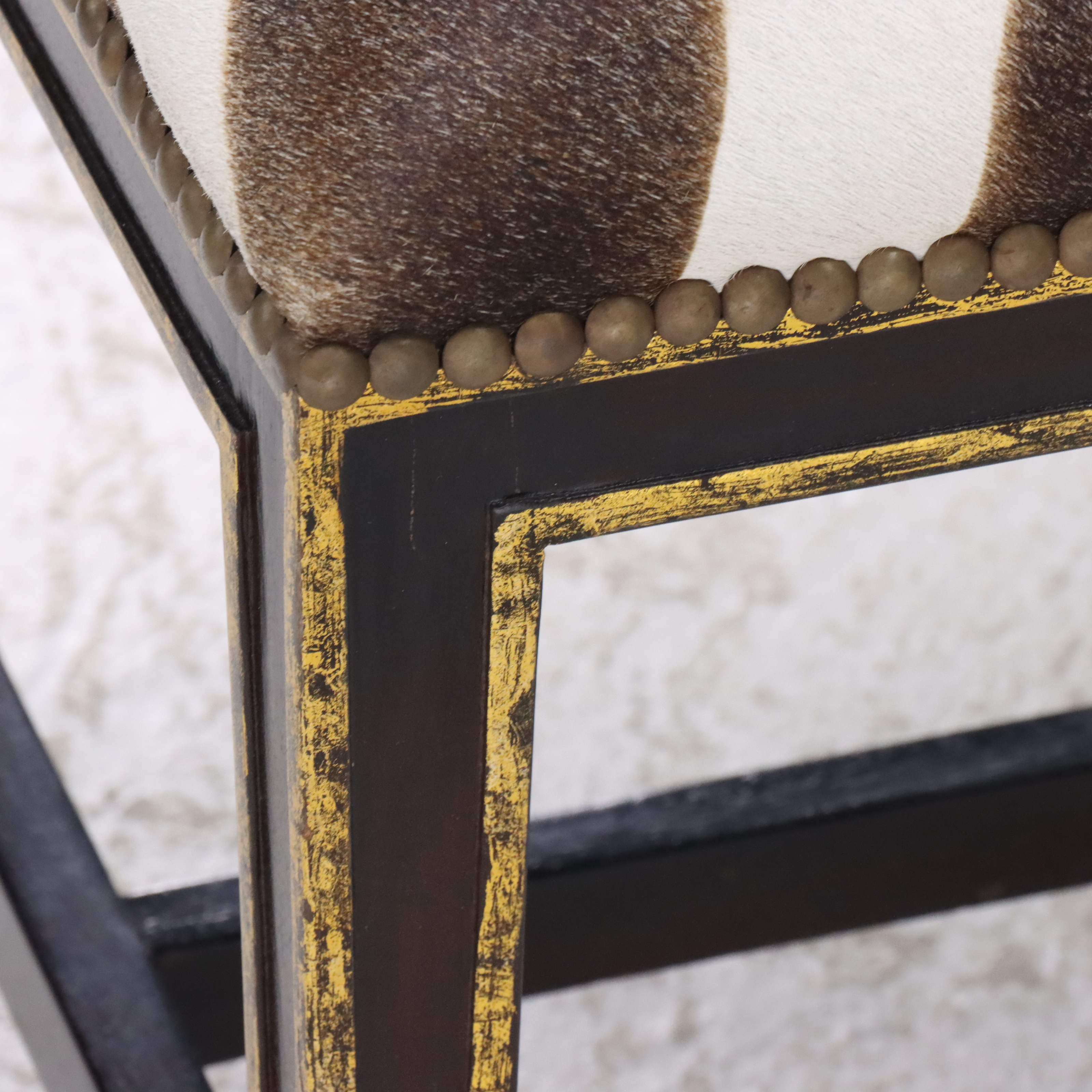 Black and Parcel Gilt Painted Bed Bench with Faux Zebra Hide