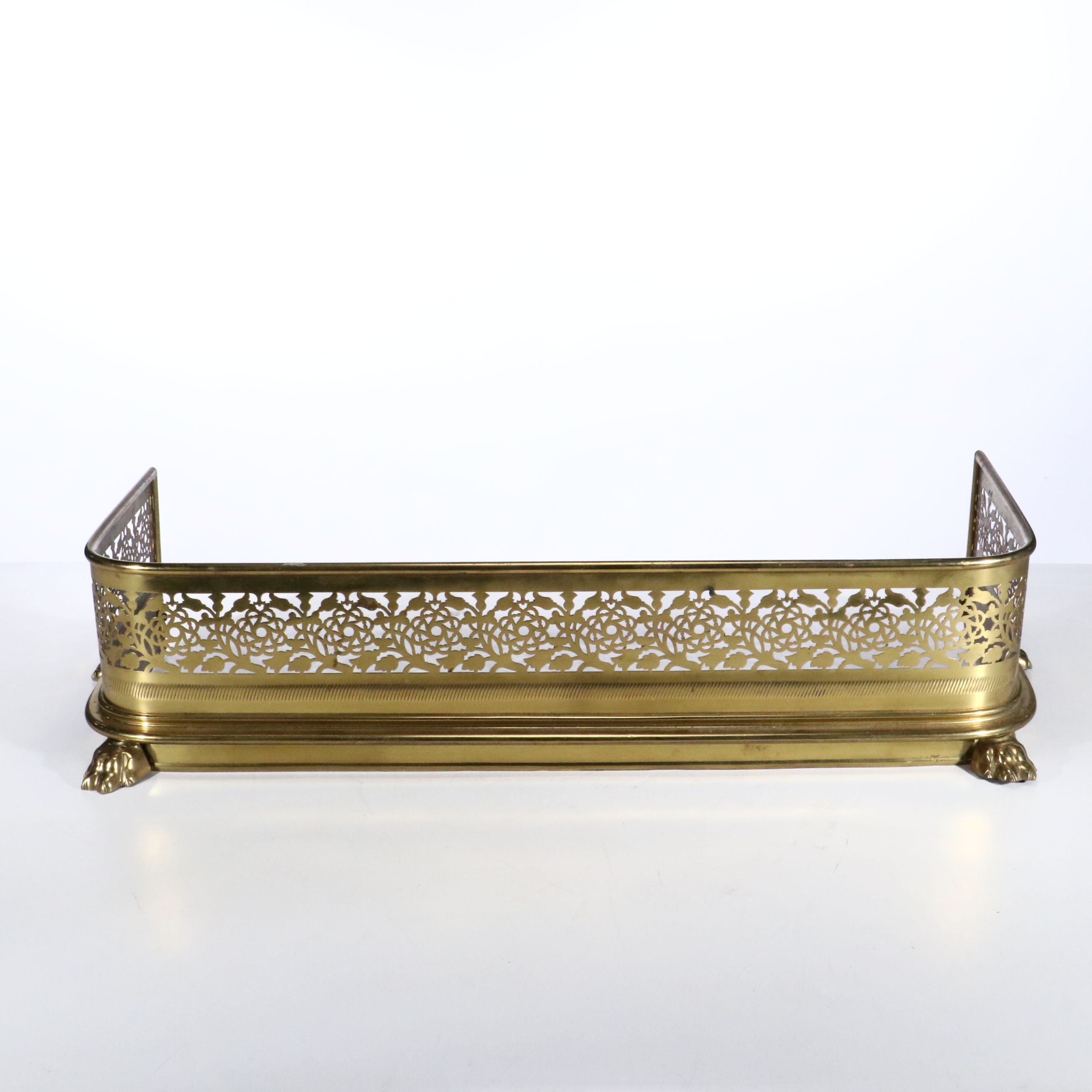 Regency Style Reticulated Brass Fireplace Fender with Paw Feet, 20th Century