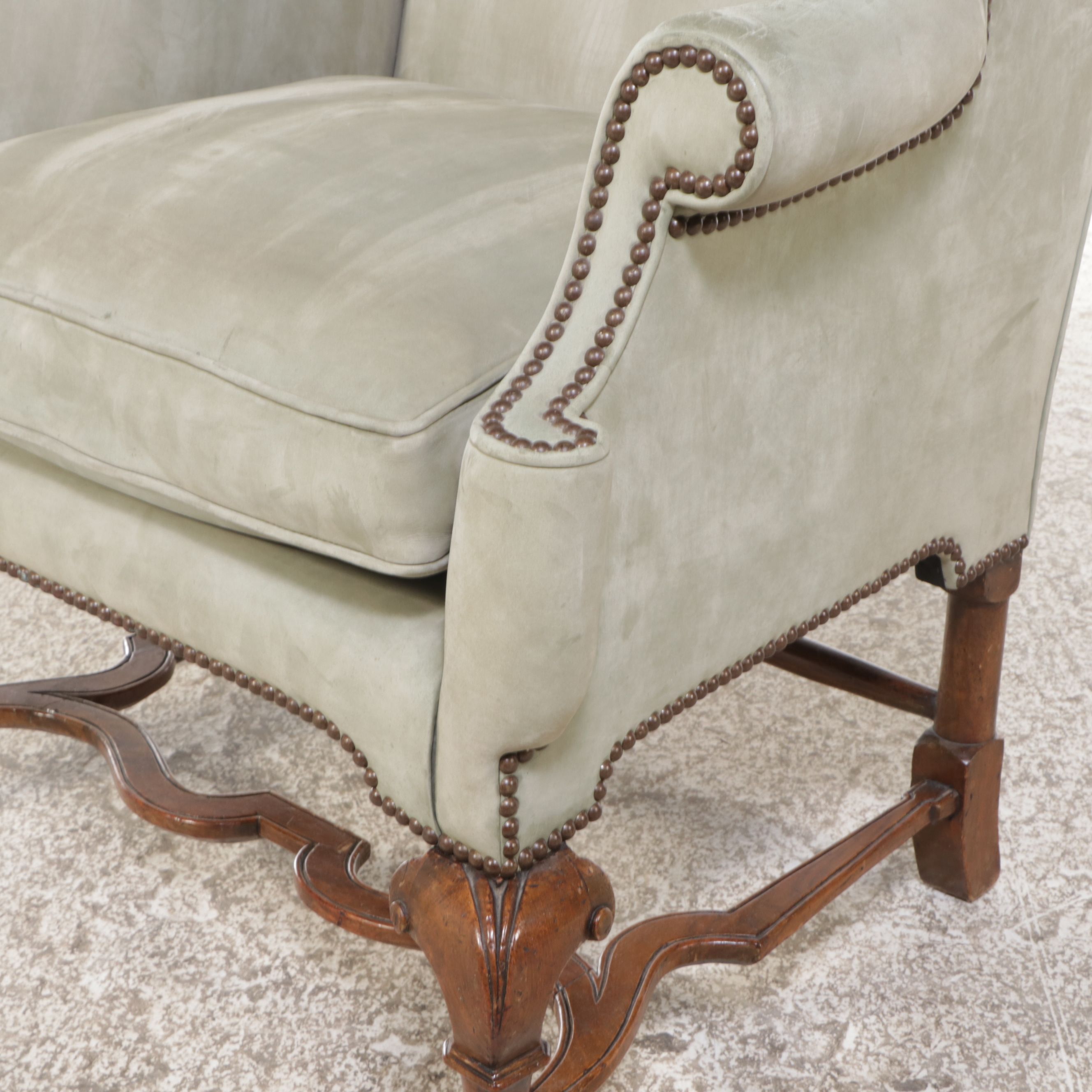 George II Style Suede and Walnut Wingback Armchair