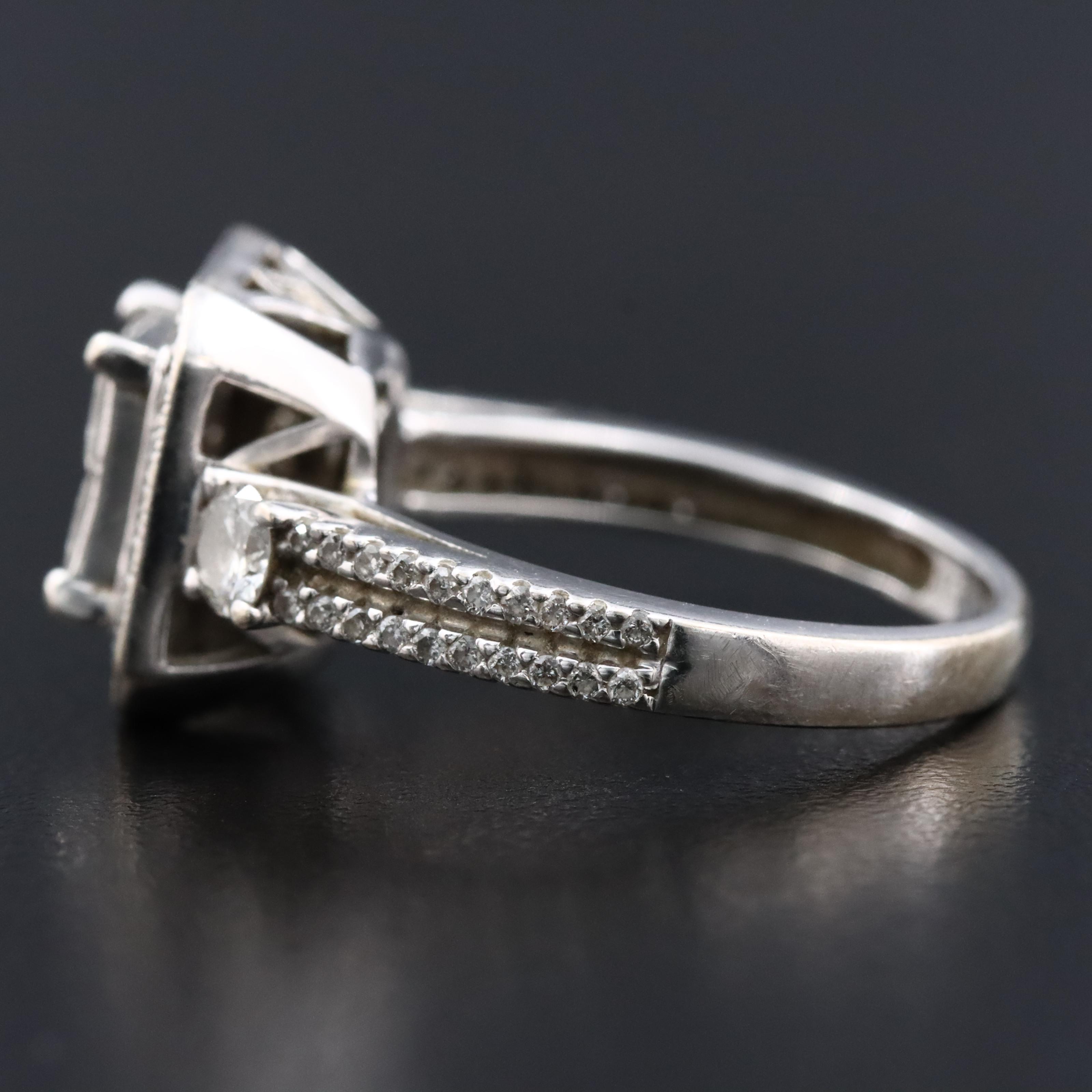 14K 1.42 CTW Diamond Invisible Set Halo Ring