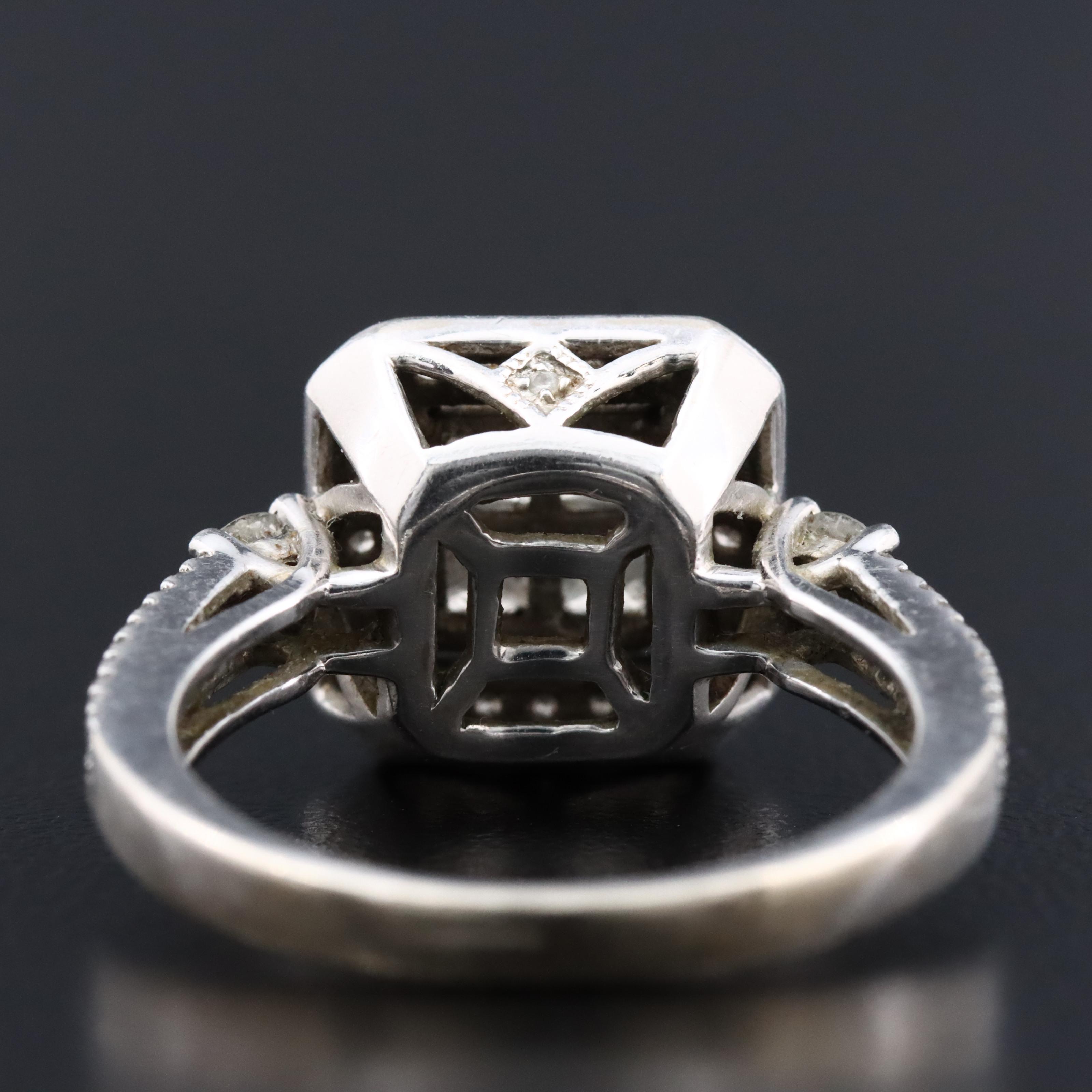 14K 1.42 CTW Diamond Invisible Set Halo Ring