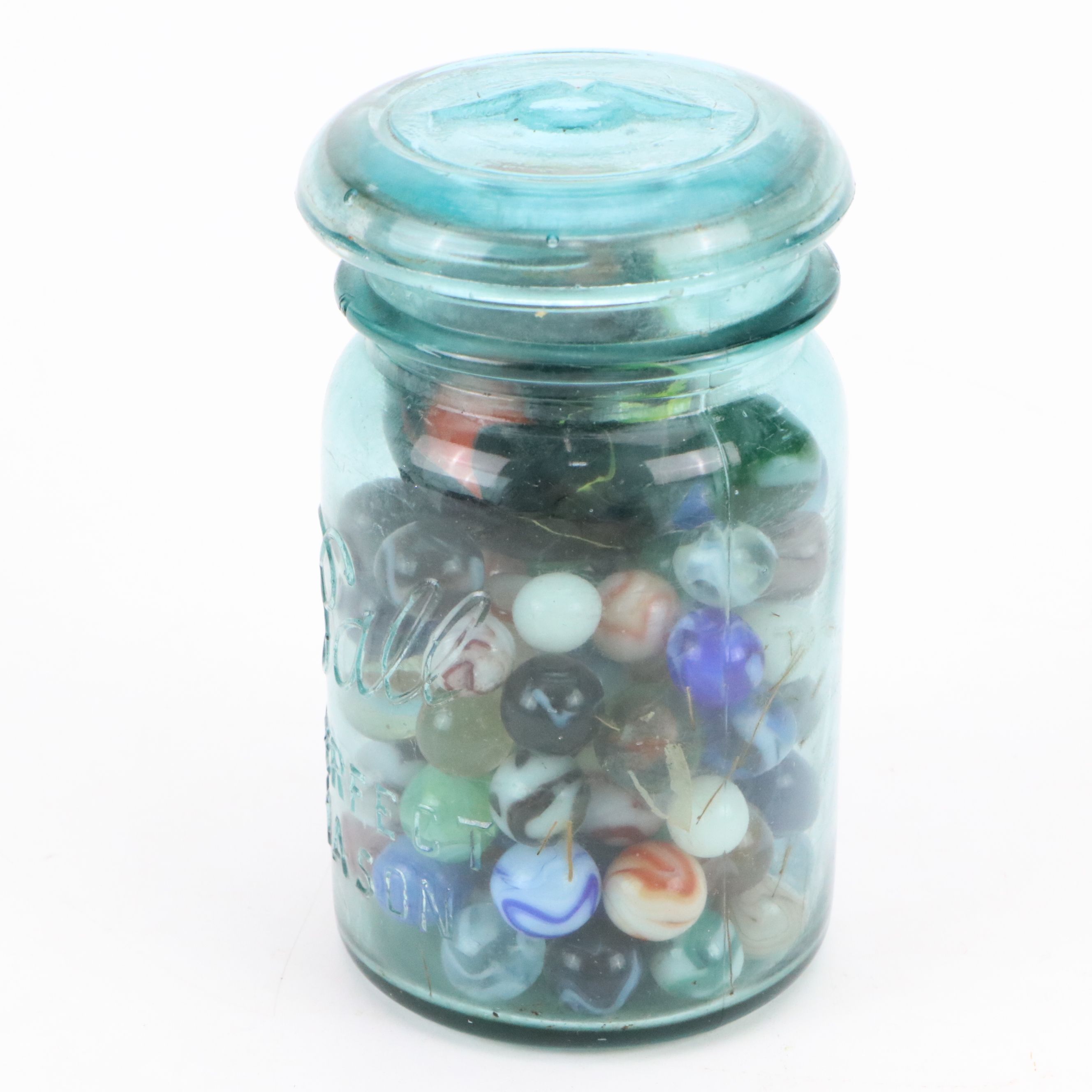 Cat's Eye, Shooters and Other Marbles in Ball Jars with Other Bottle of Jacks
