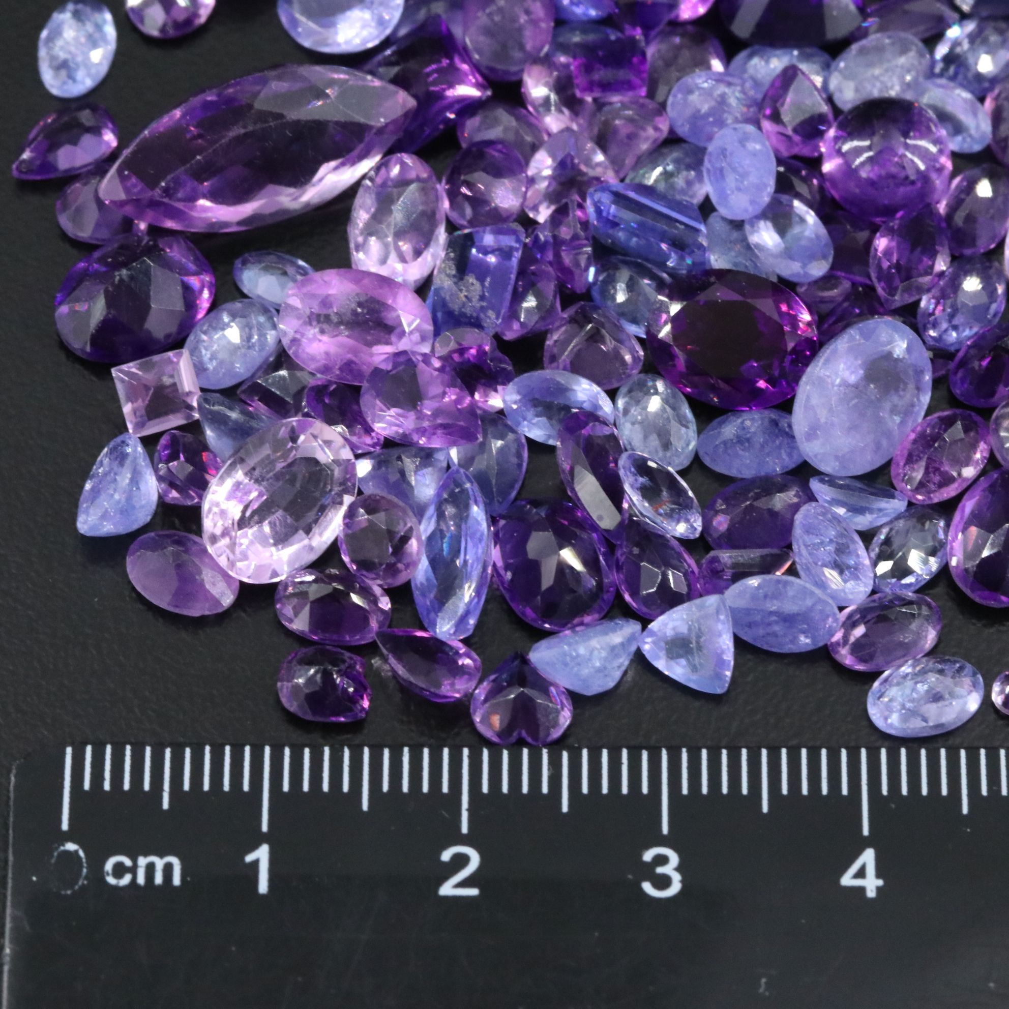 Loose 95.80 CTW Amethysts and Tanzanties