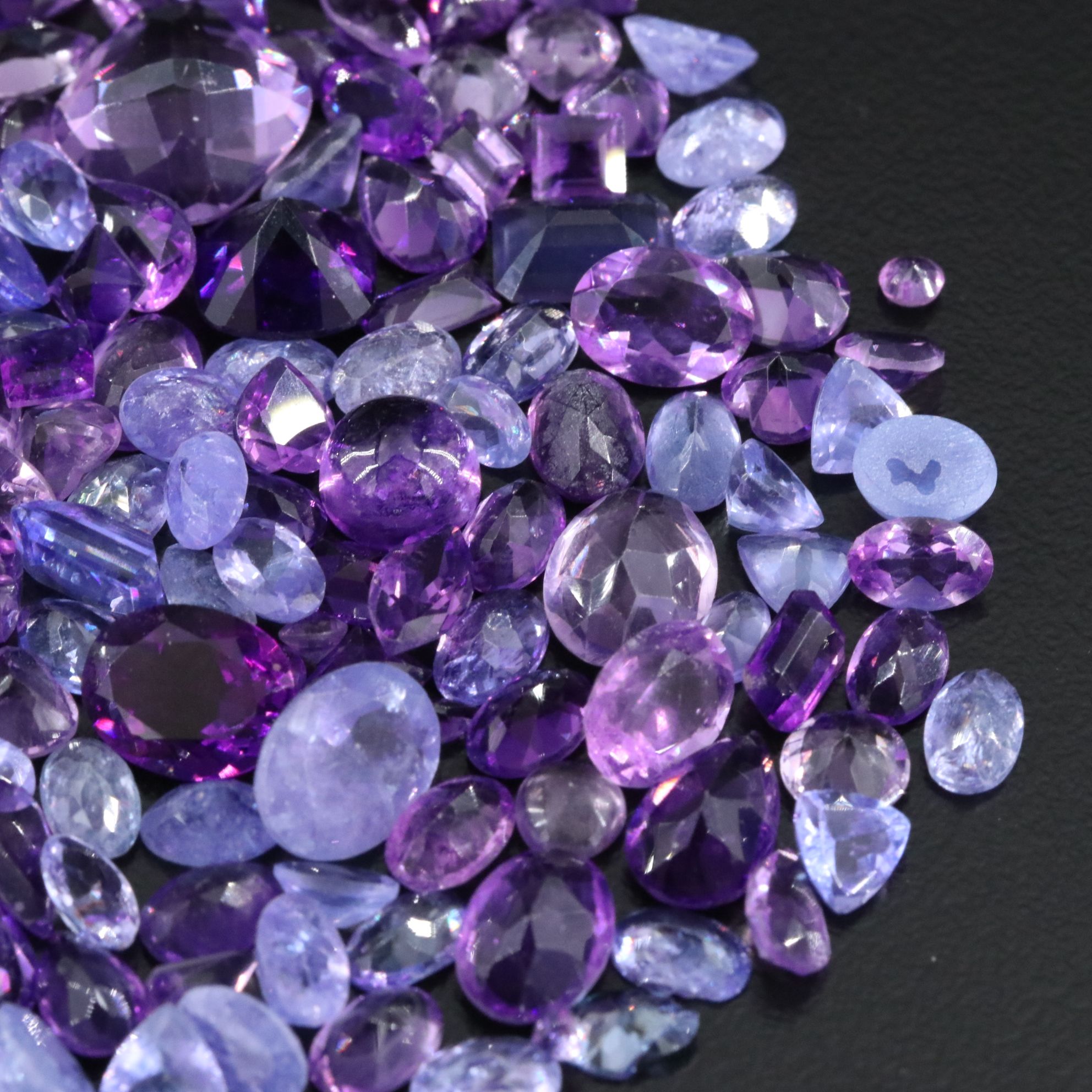 Loose 95.80 CTW Amethysts and Tanzanties