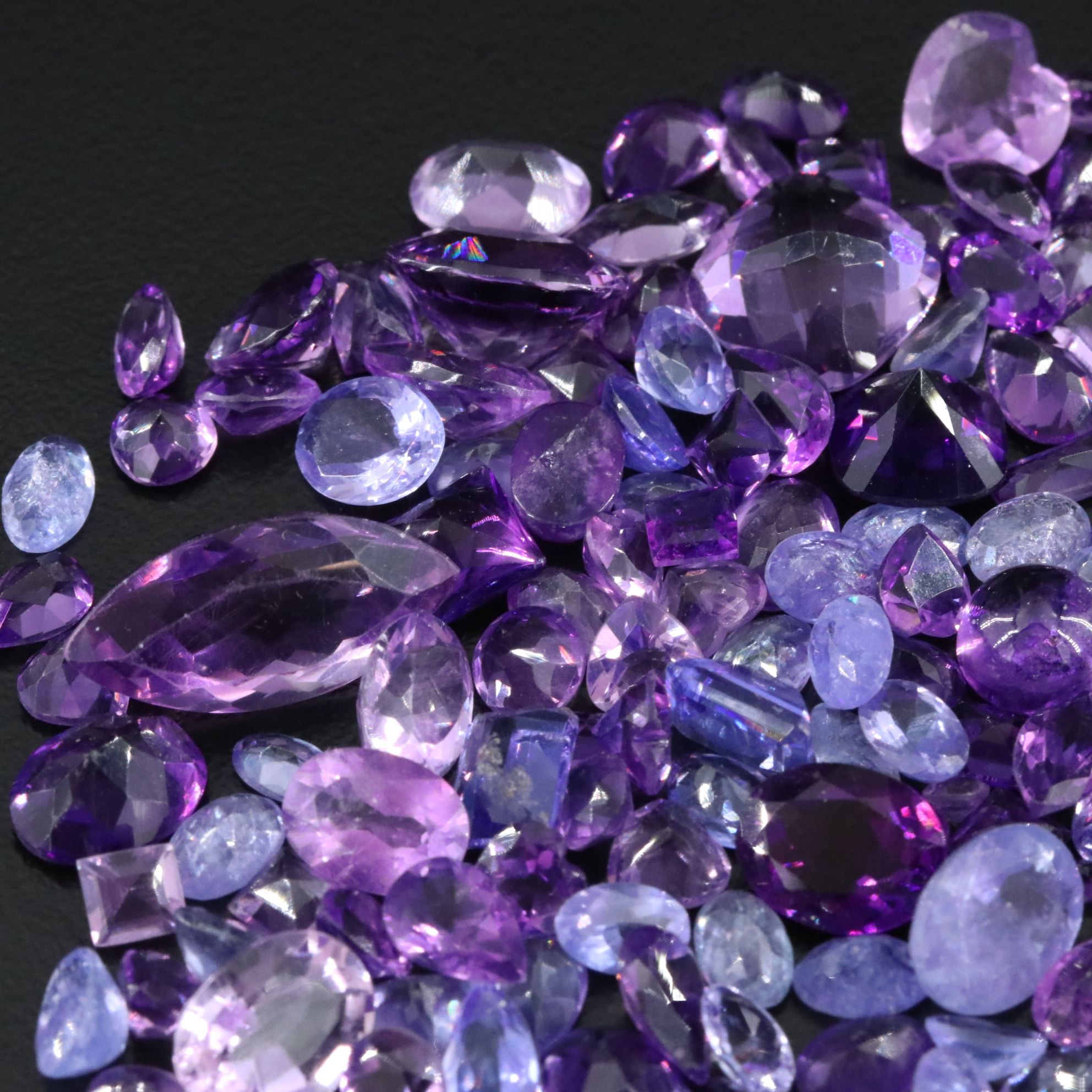 Loose 95.80 CTW Amethysts and Tanzanties