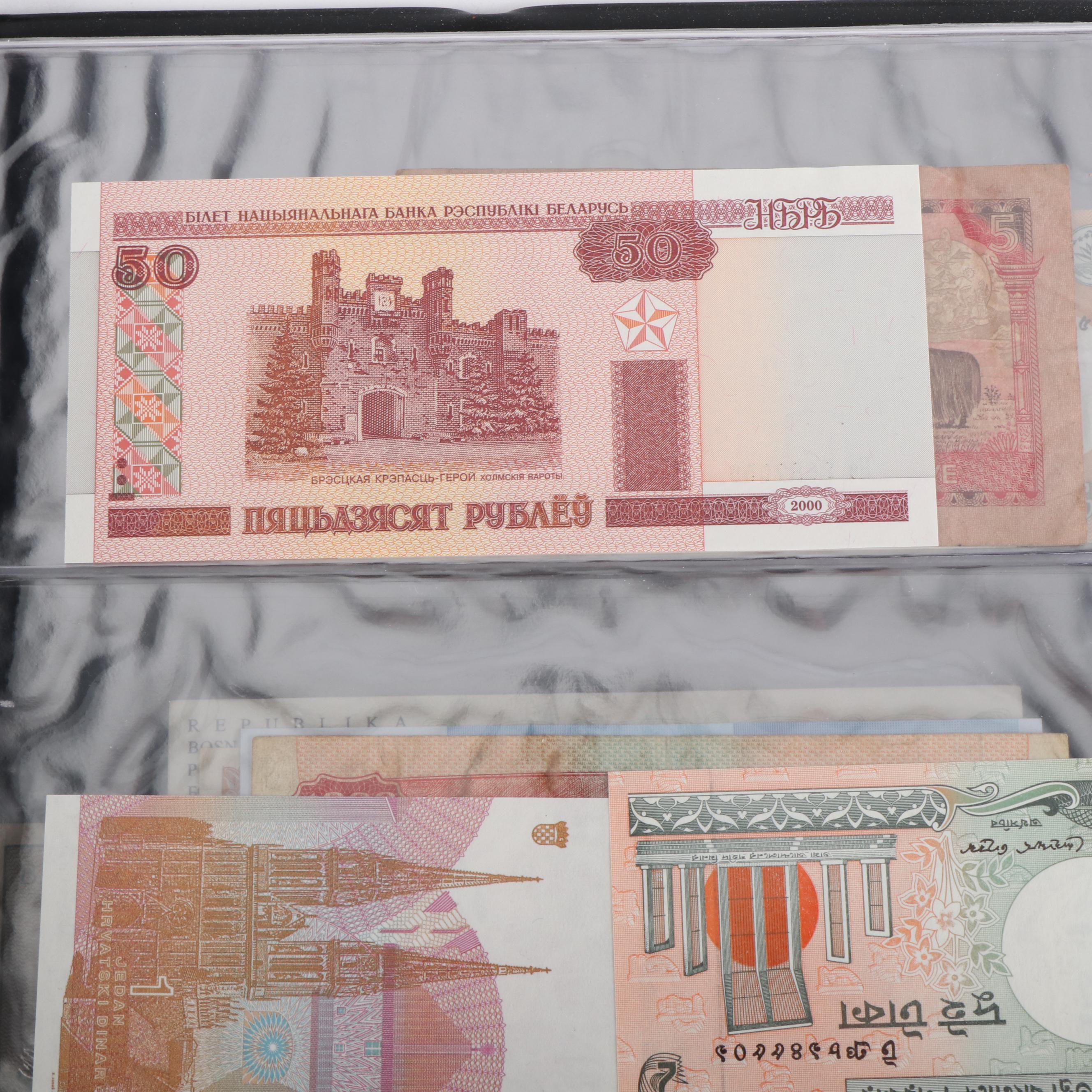 Collection of More Than 200 Pieces of Currency From Around the World