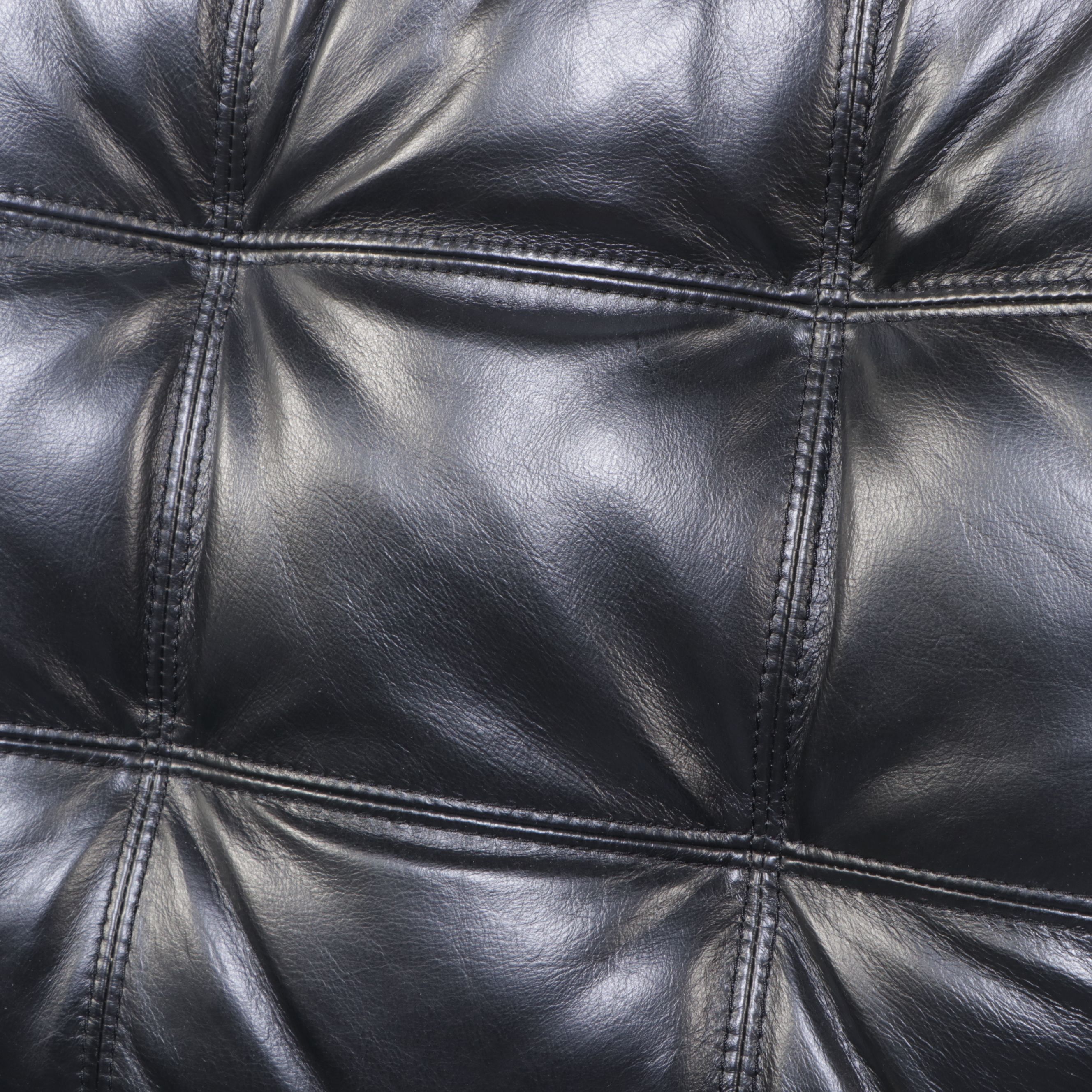Contemporary Tufted Black Leather Armchair with Ottoman