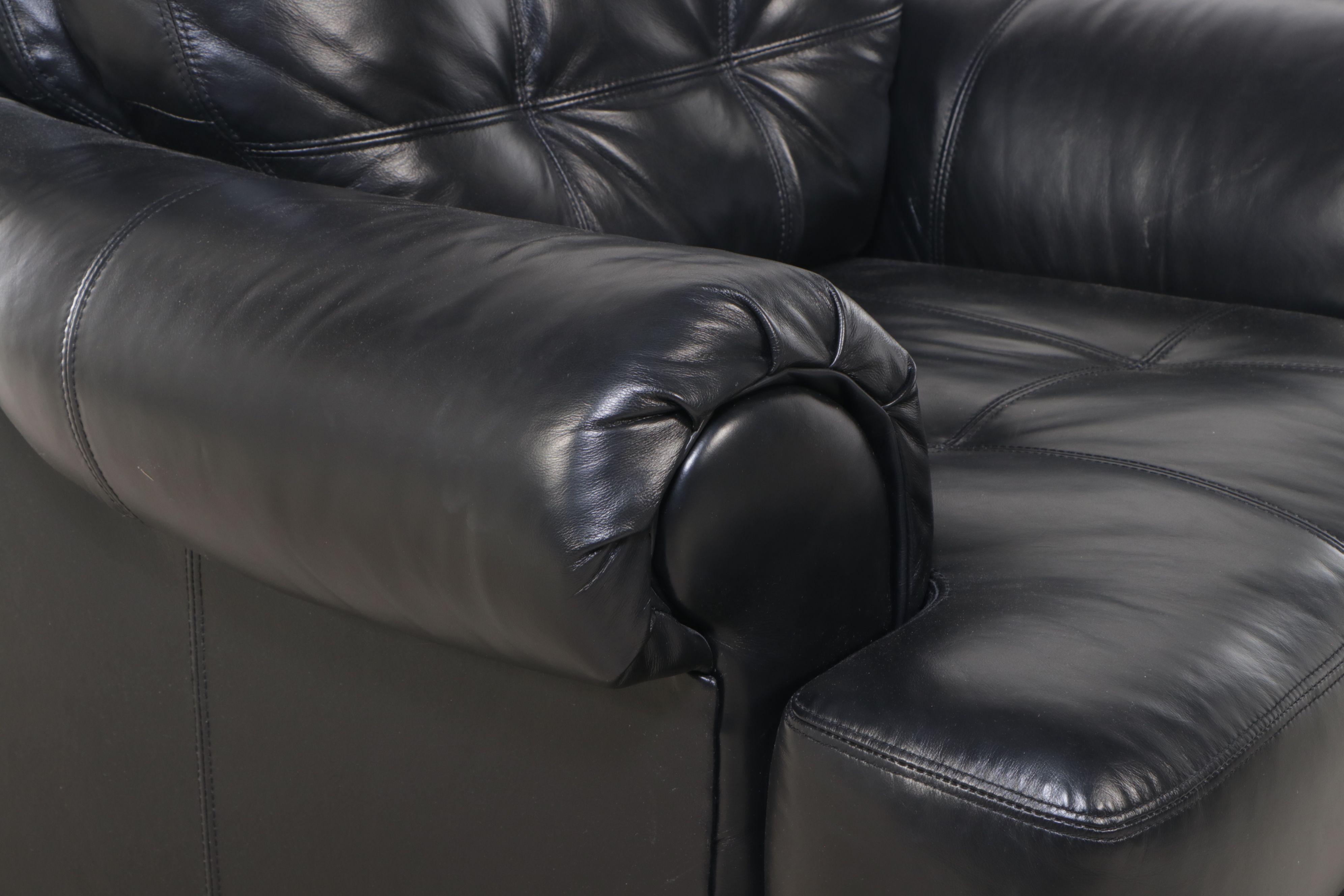 Contemporary Tufted Black Leather Armchair with Ottoman