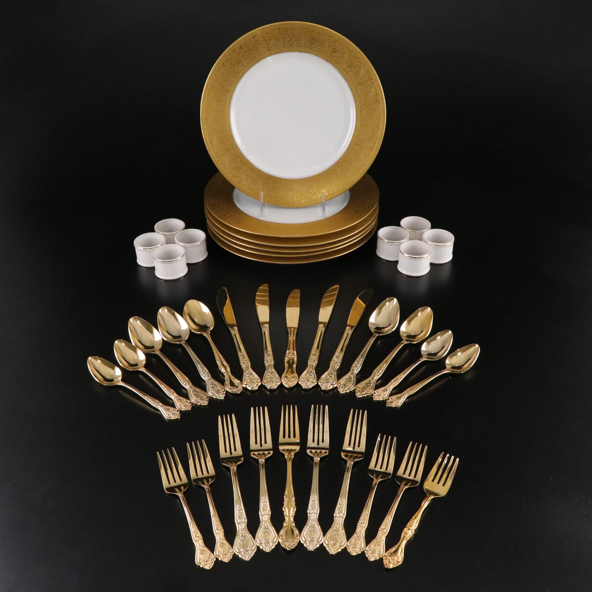 Henrich & Co. Gold Rim Porcelain Dinner Plates with Rogers Gold-Tone Flatware