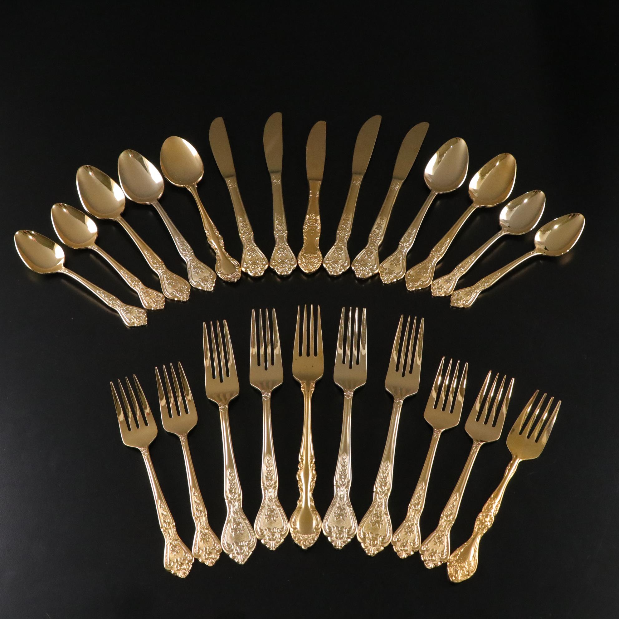 Henrich & Co. Gold Rim Porcelain Dinner Plates with Rogers Gold-Tone Flatware