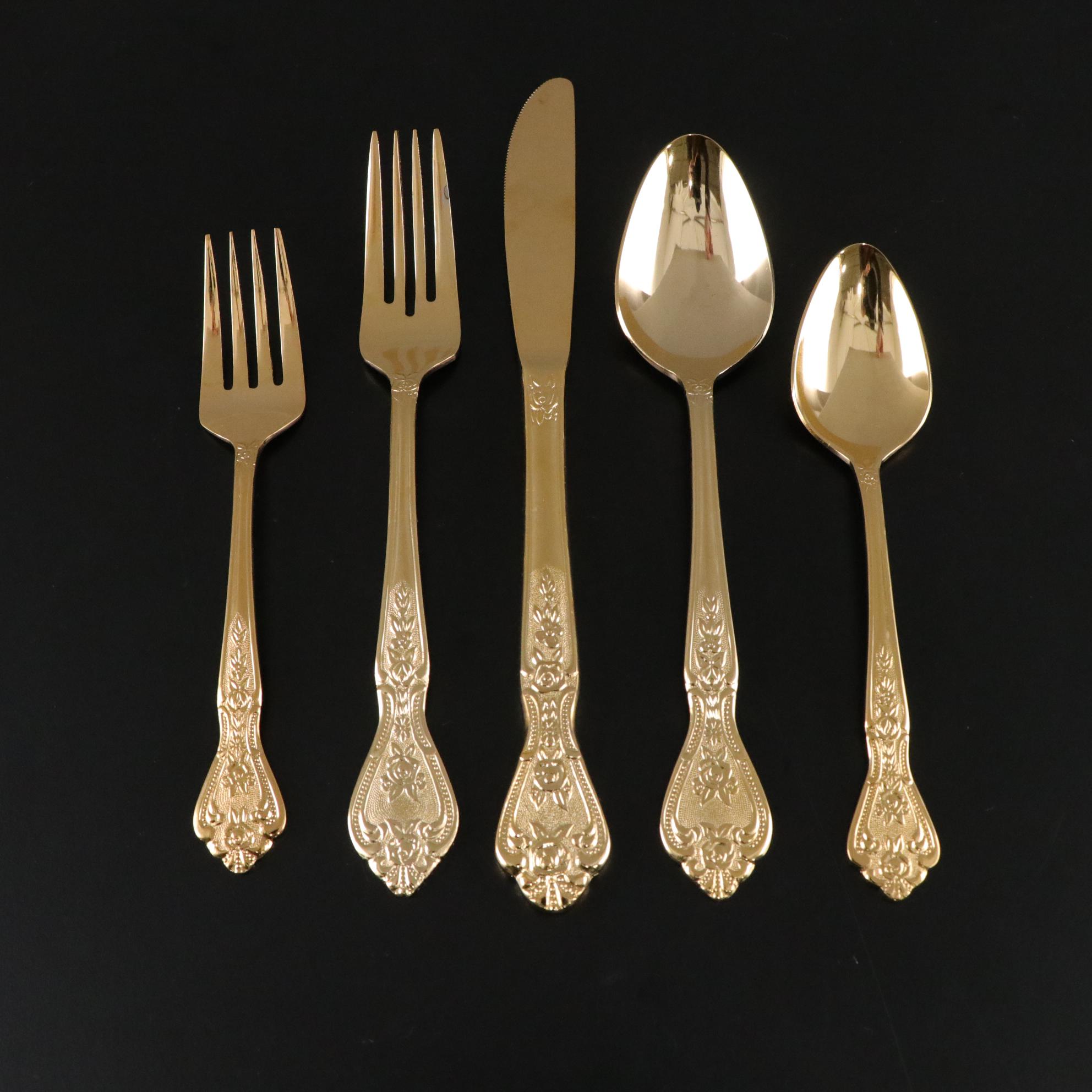 Henrich & Co. Gold Rim Porcelain Dinner Plates with Rogers Gold-Tone Flatware