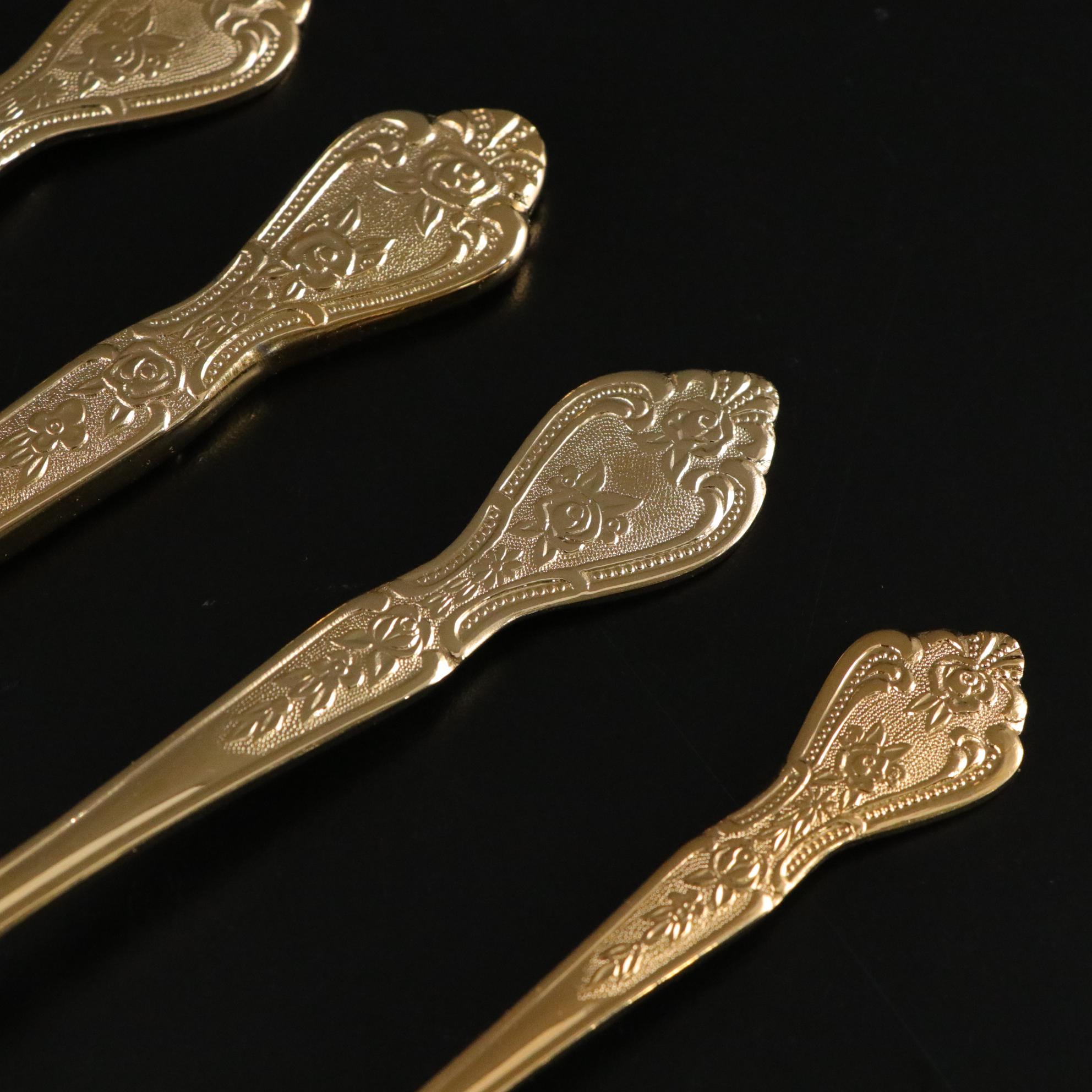 Henrich & Co. Gold Rim Porcelain Dinner Plates with Rogers Gold-Tone Flatware