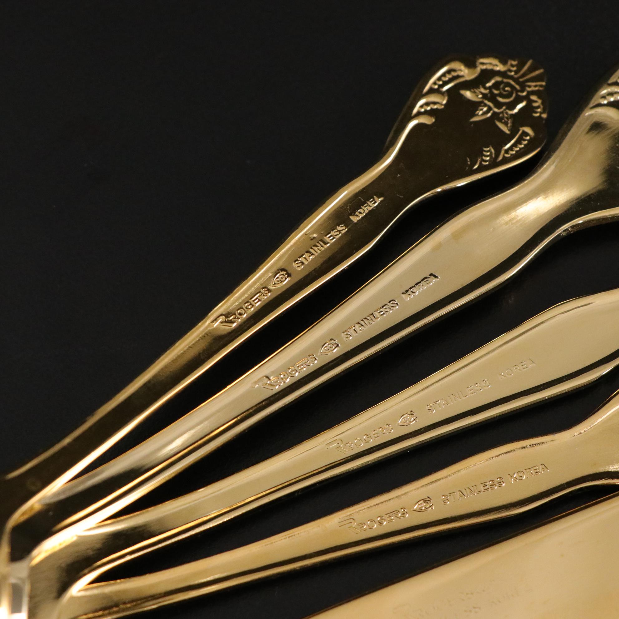 Henrich & Co. Gold Rim Porcelain Dinner Plates with Rogers Gold-Tone Flatware