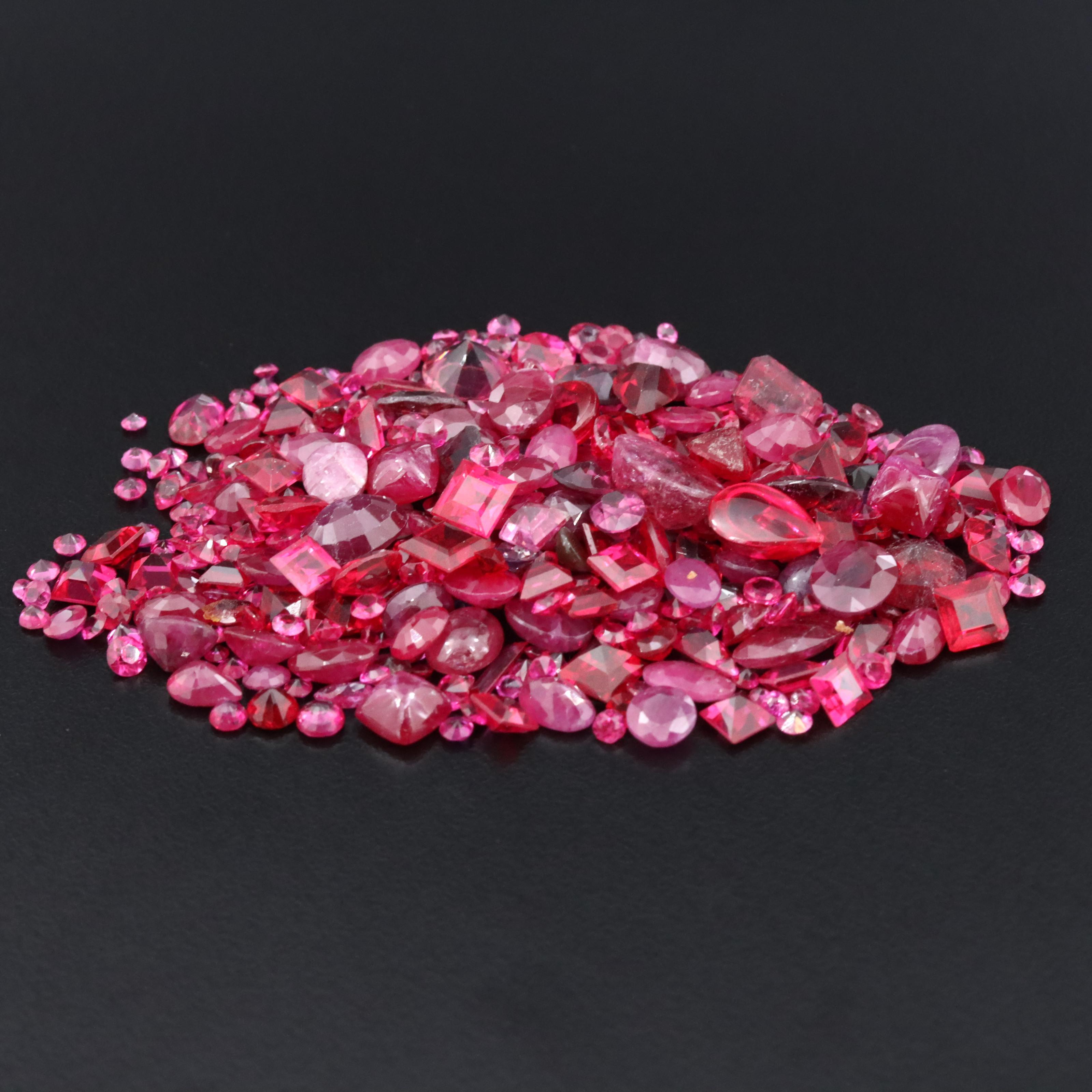 Loose 112.46 CTW Rubies, Lab Grown Rubies and Glass Selection
