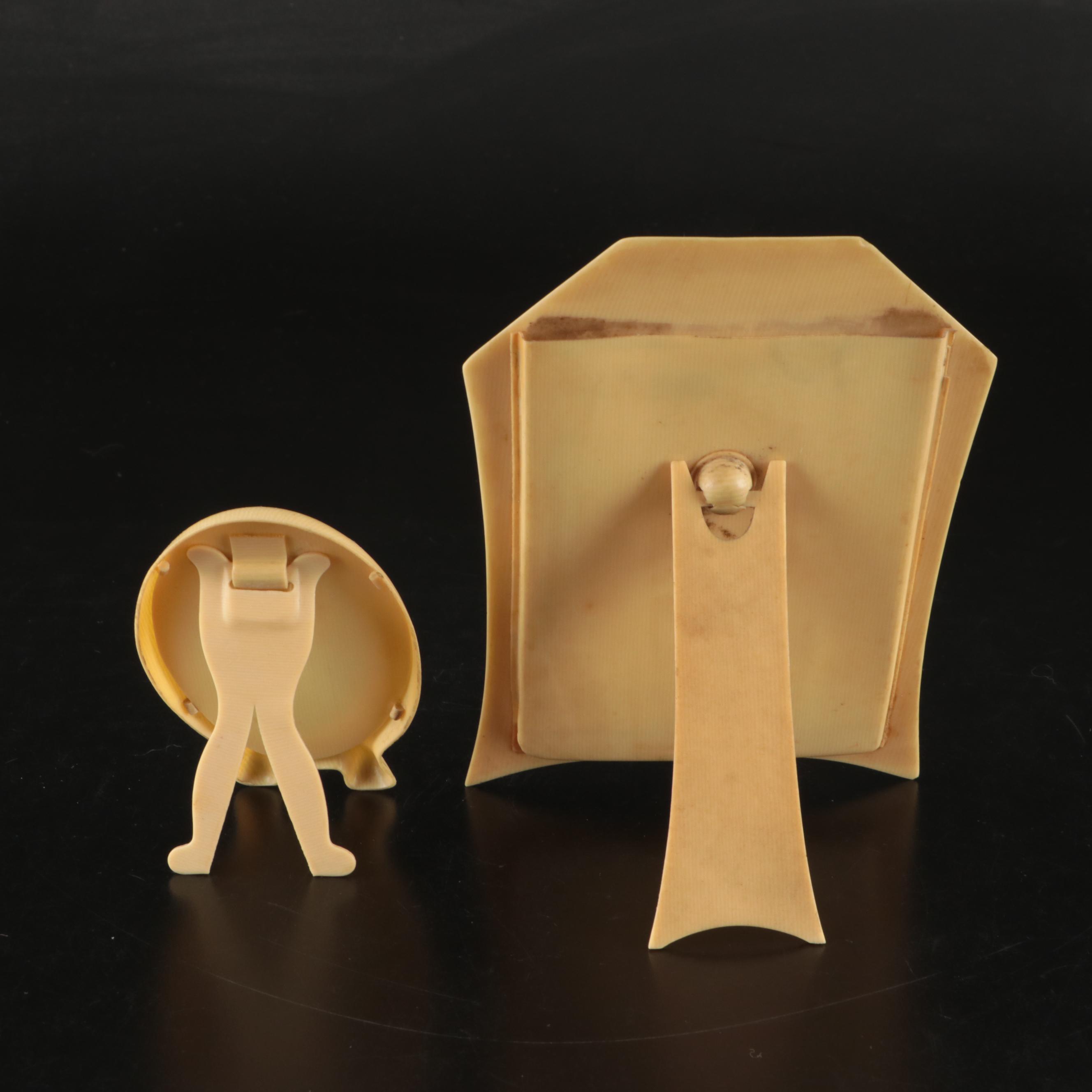 Photographs of Men and Women in Celluloid Frames with Dish